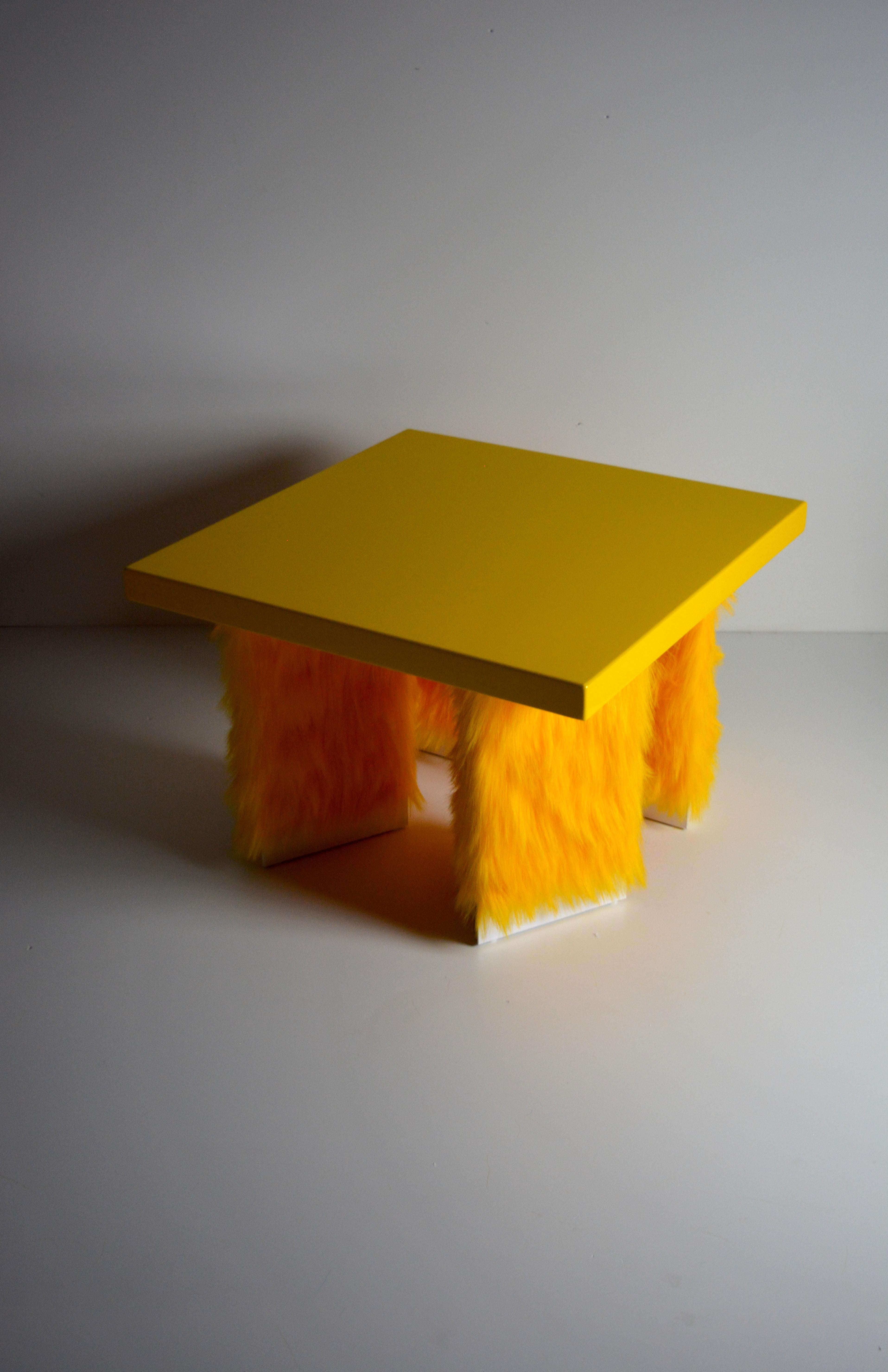 Italian Eccentrico, contemporary coffee table yellow fur-lacquered wood by Studio Greca For Sale