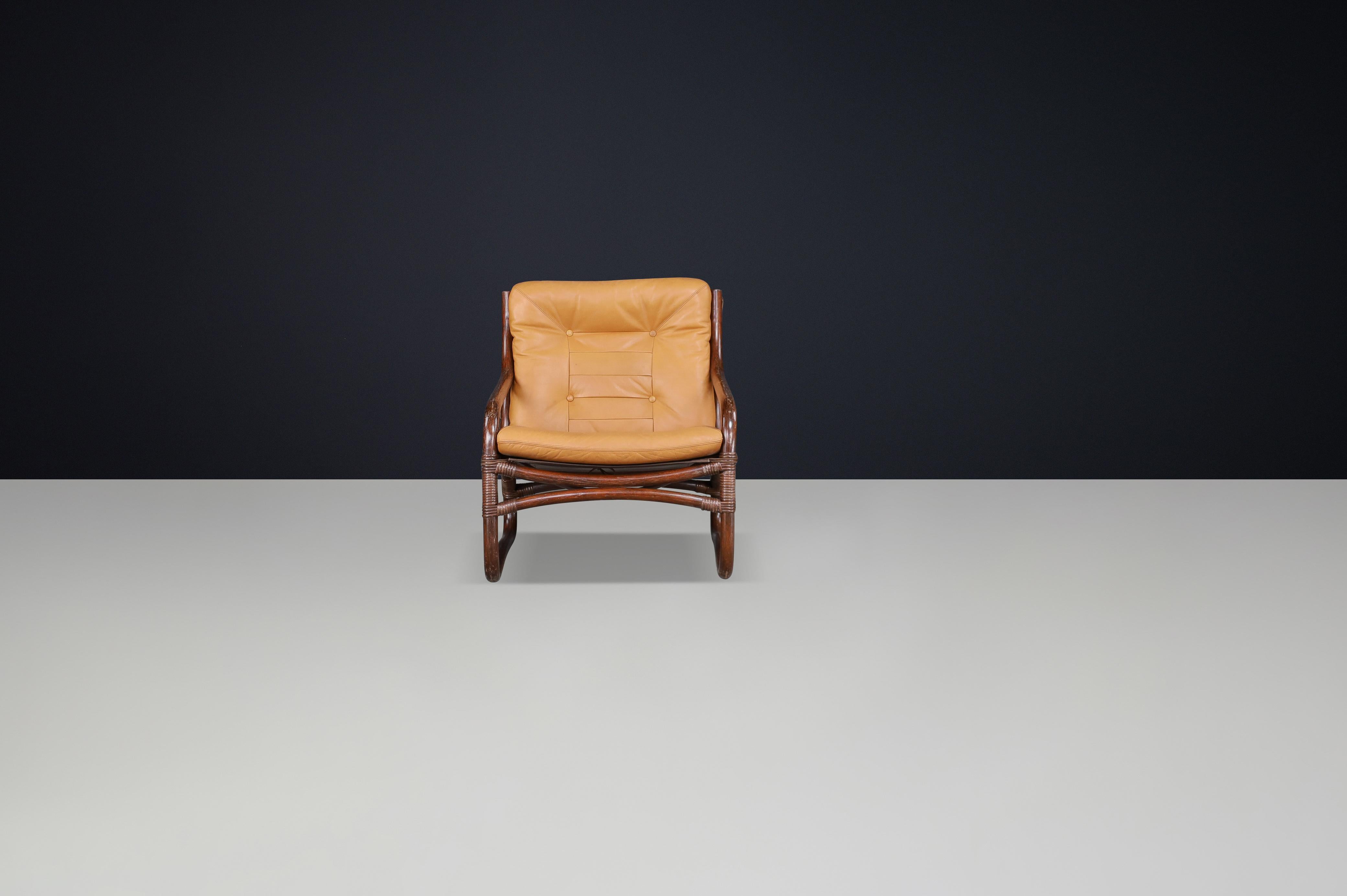 Scandinavian Modern “Ecco” Easy Chair by Slettvoll in Cognac Leather and Rattan, Norway 1970s For Sale