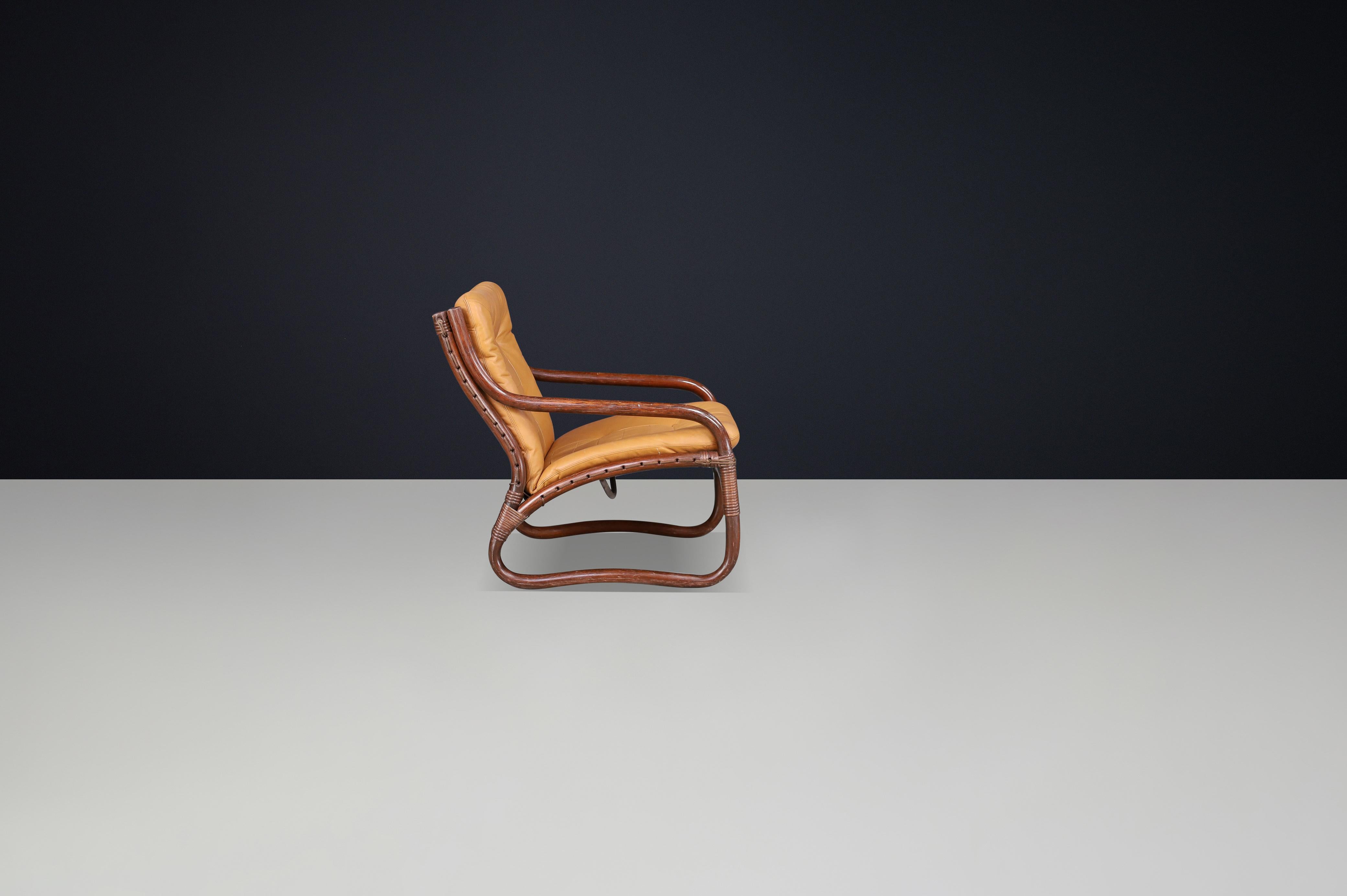 “Ecco” Easy Chair by Slettvoll in Cognac Leather and Rattan, Norway 1970s In Good Condition For Sale In Almelo, NL