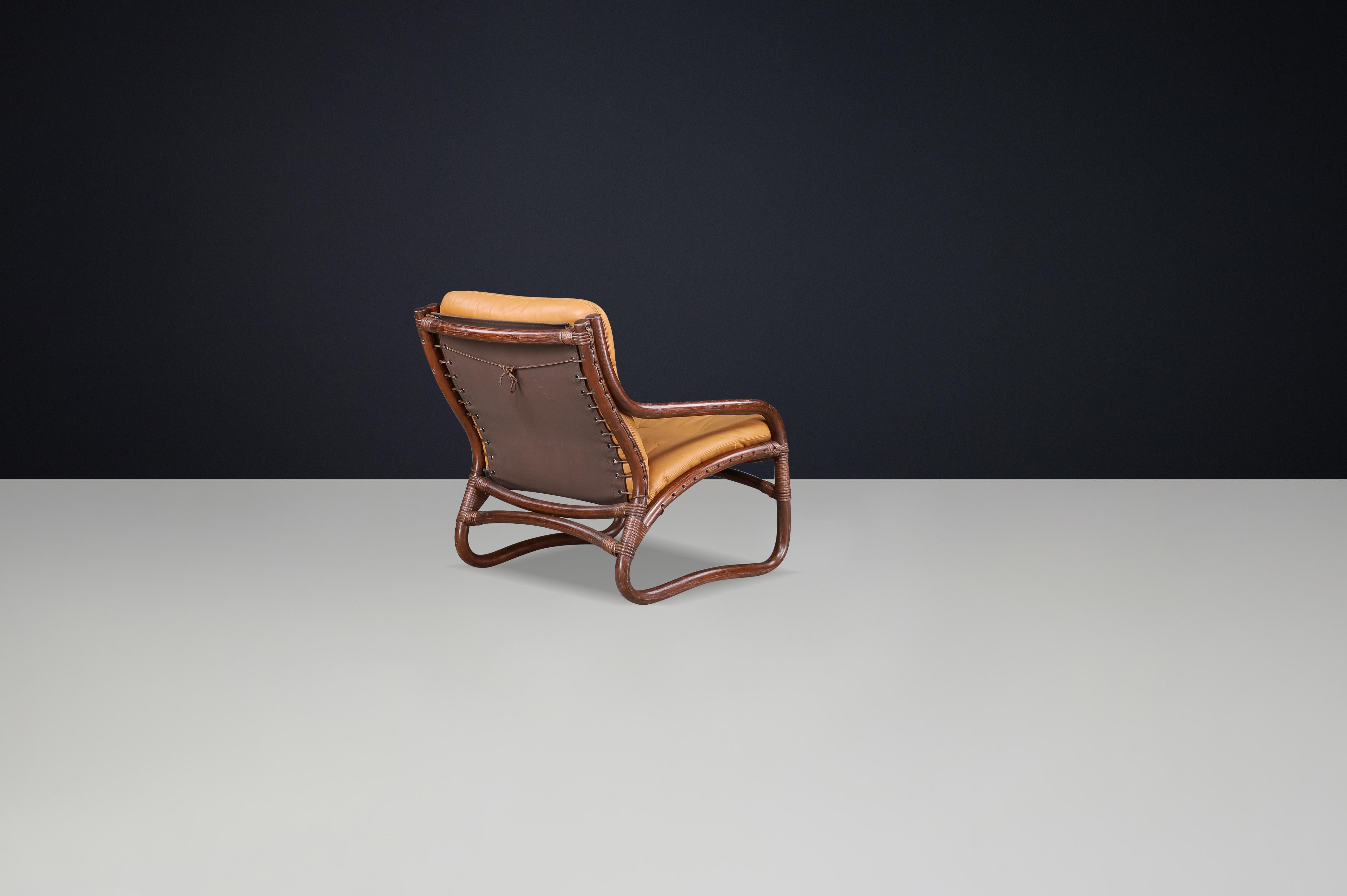 20th Century “Ecco” Easy Chair by Slettvoll in Cognac Leather and Rattan, Norway 1970s For Sale