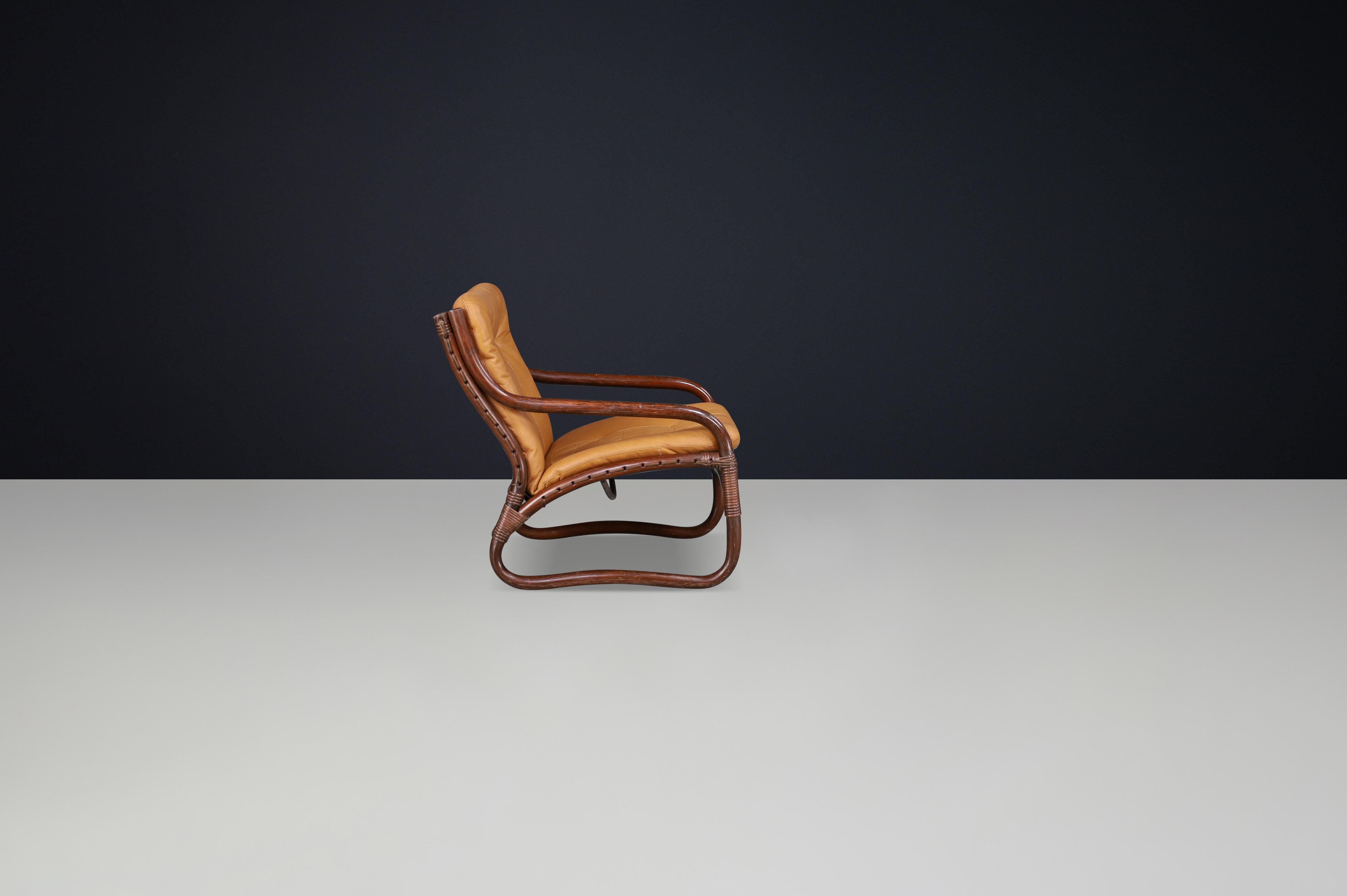 “Ecco” Easy Chair by Slettvoll in Cognac Leather and Rattan, Norway 1970s For Sale 1