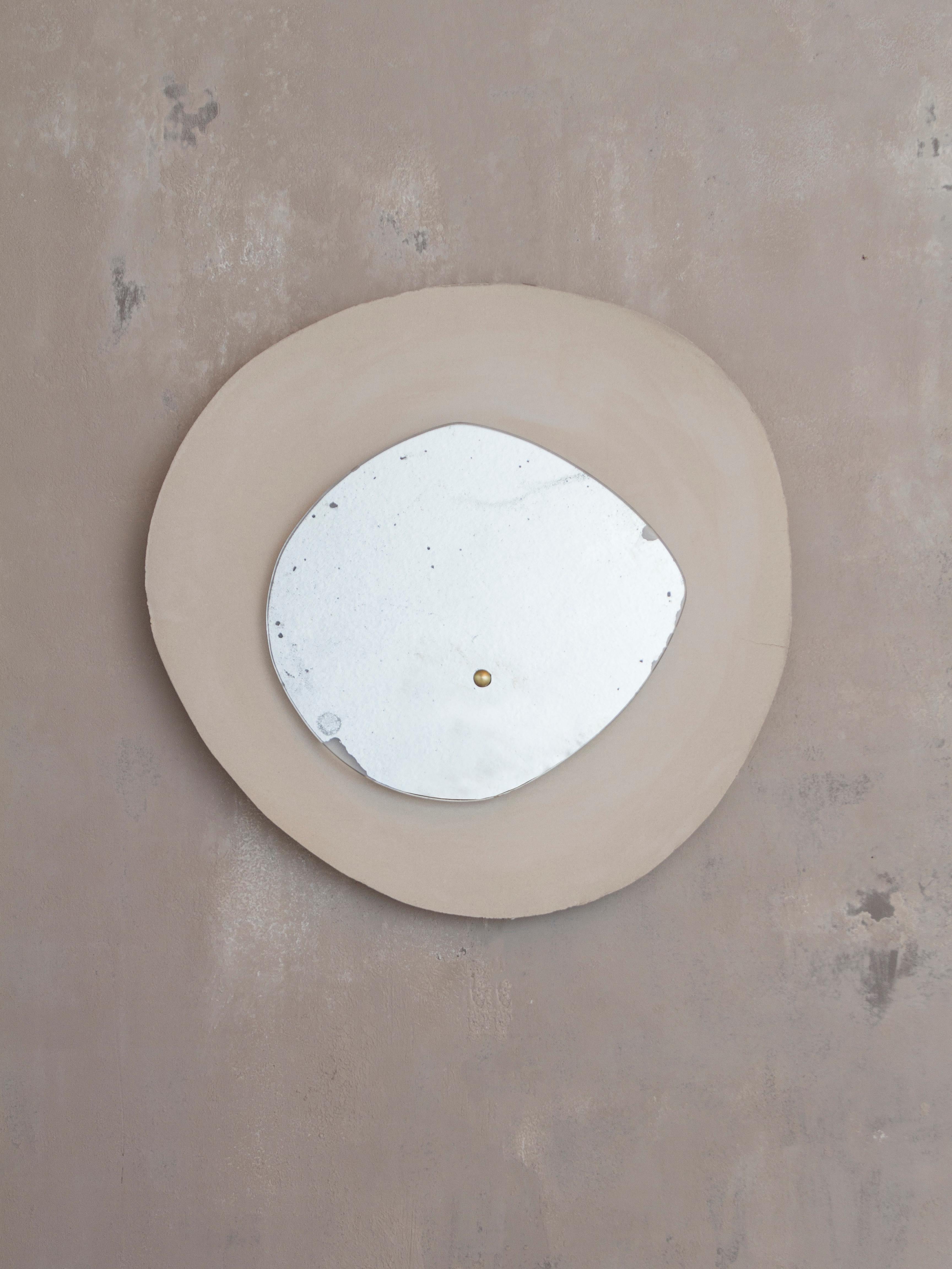 Echo #2 wall light by Margaux Leycuras
One of a Kind, Signed and numbered
Dimensions: D 6 x W 55 x H 55 cm 
Material: Ceramic, sand stoneware top with a porcelain engobe finish and old mercury mirror.
The piece is signed, numbered and delivered