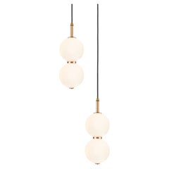 Echo Pendant Lamp. Opal Glass Orbs, Brass Metalwork. Integrated LED