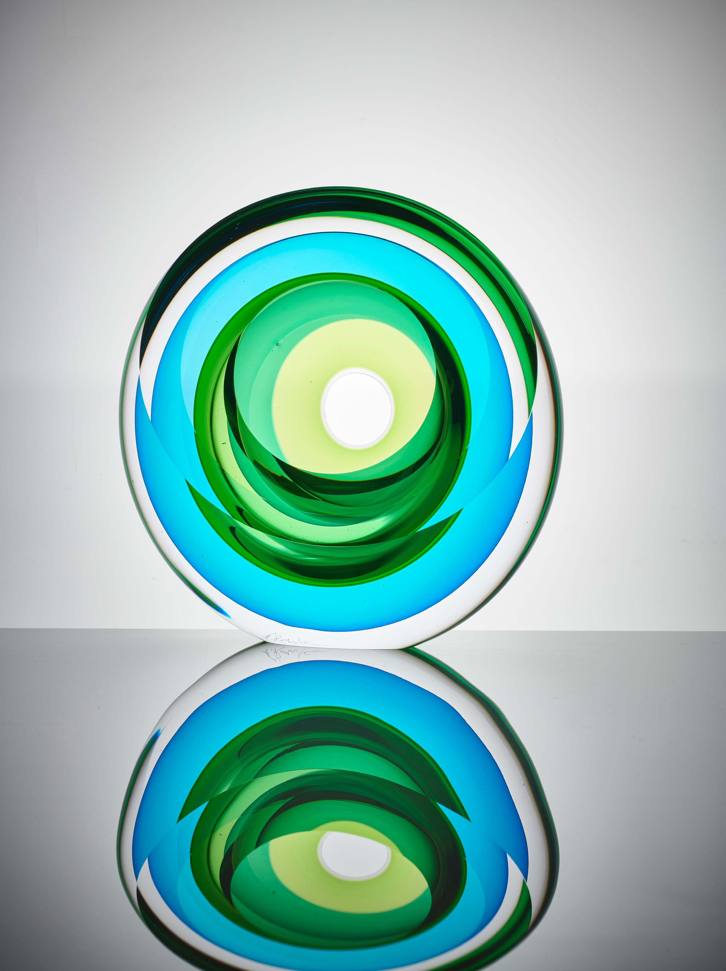 Echoes of Light, 2021 (Glass, C. 11.4 in. h x 11.4 in. w x 4.3 in. d, Object No.: 4098)

Tim Rawlinson’s fascination with the way light passes through glass informs his work. He exploits transparency, as its essential and primary quality,