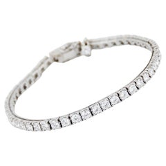 Bracelet tennis de la collection ECJ en or blanc 18 carats avec diamants de 5,88 carats