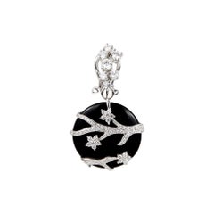 Pendientes de ónix negro de oro blanco de 18k de la colección Ecj