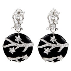 Pendientes de ónix negro de oro blanco de 18k de la colección Ecj