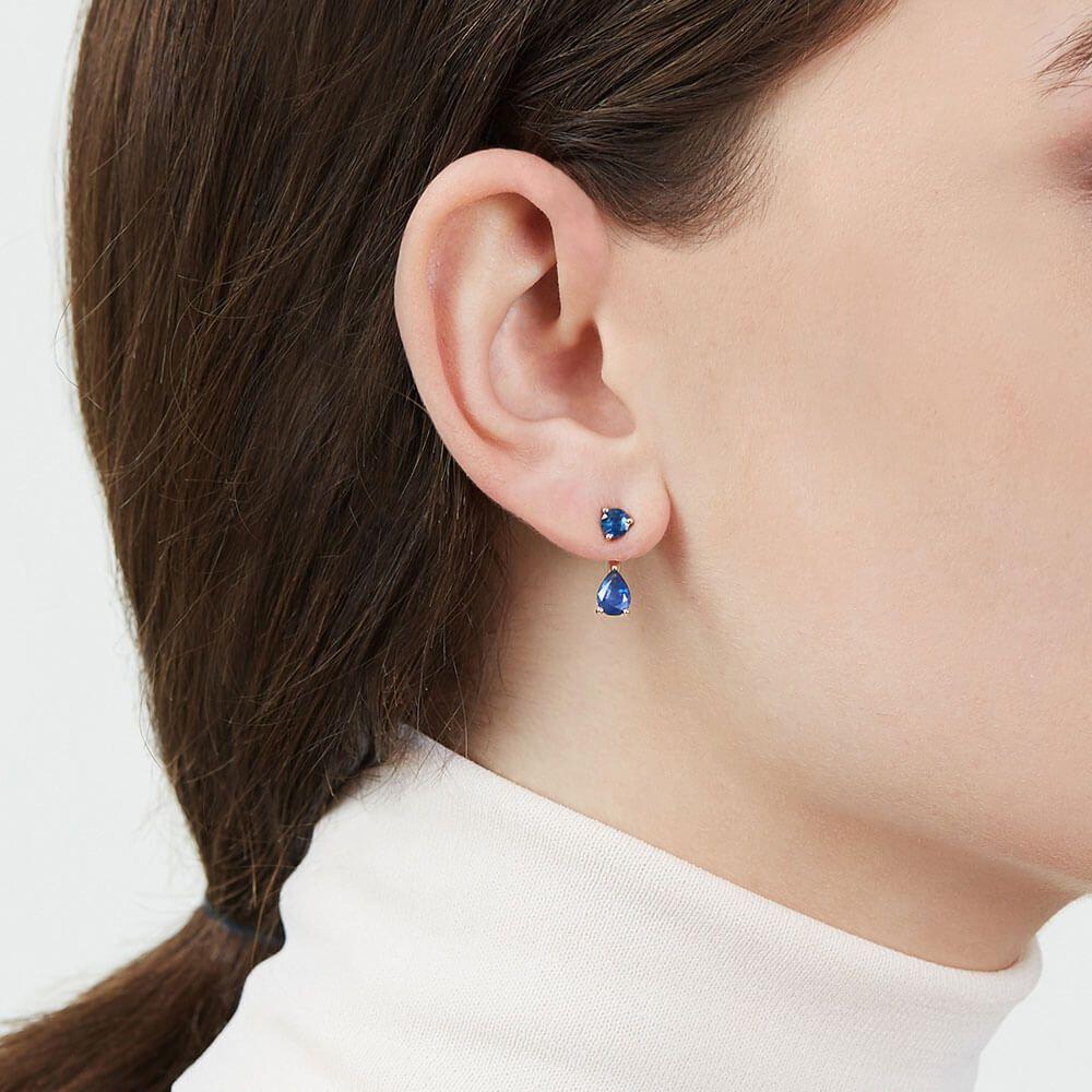In living colour. Add a pop of colour to your look with these Ecksand Pure Gemstone blue sapphire earrings. These jacket earrings feature a modern, trendy design. They are set with round and pear cut blue sapphires that dangle from the ear.