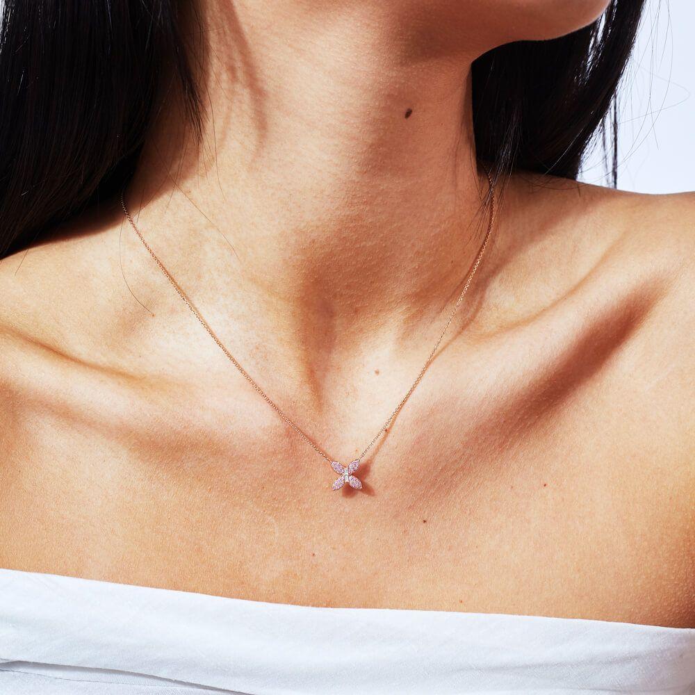 Walk on the wild side. This Ecksand Wild butterfly necklace is a romantic statement piece. This butterfly necklace features a vibrant pink sapphire pavé. The natural diamonds are set in rose gold to suit all skin tones. The delicate pendant is fixed