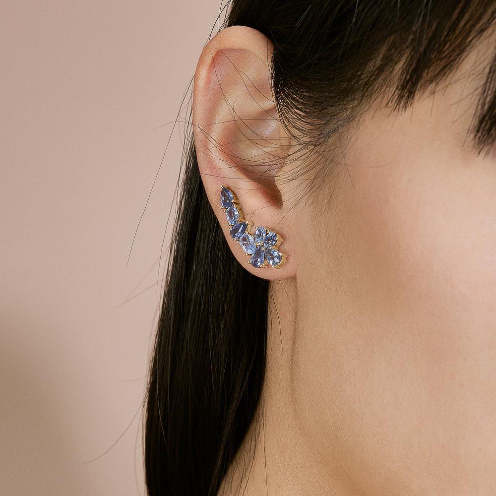 As unique as you are. These Ecksand One of a Kind crawlers earrings have a unique look you'll never find anywhere else. These earrings are set with a combination of pear and oval cut blue sapphires. Our GIA-certified experts have chosen each