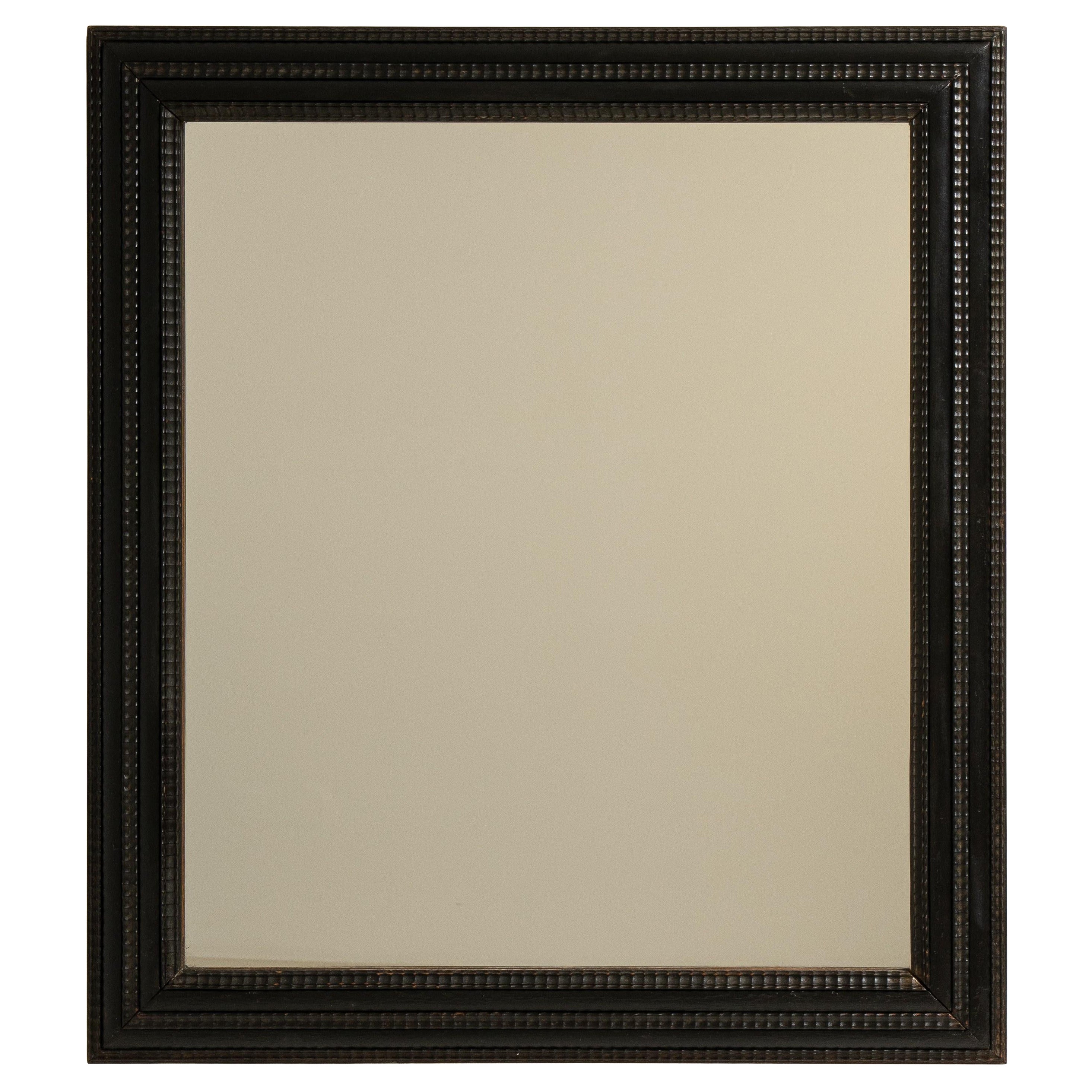 Eclectic Black-Patinated Mirror For Sale