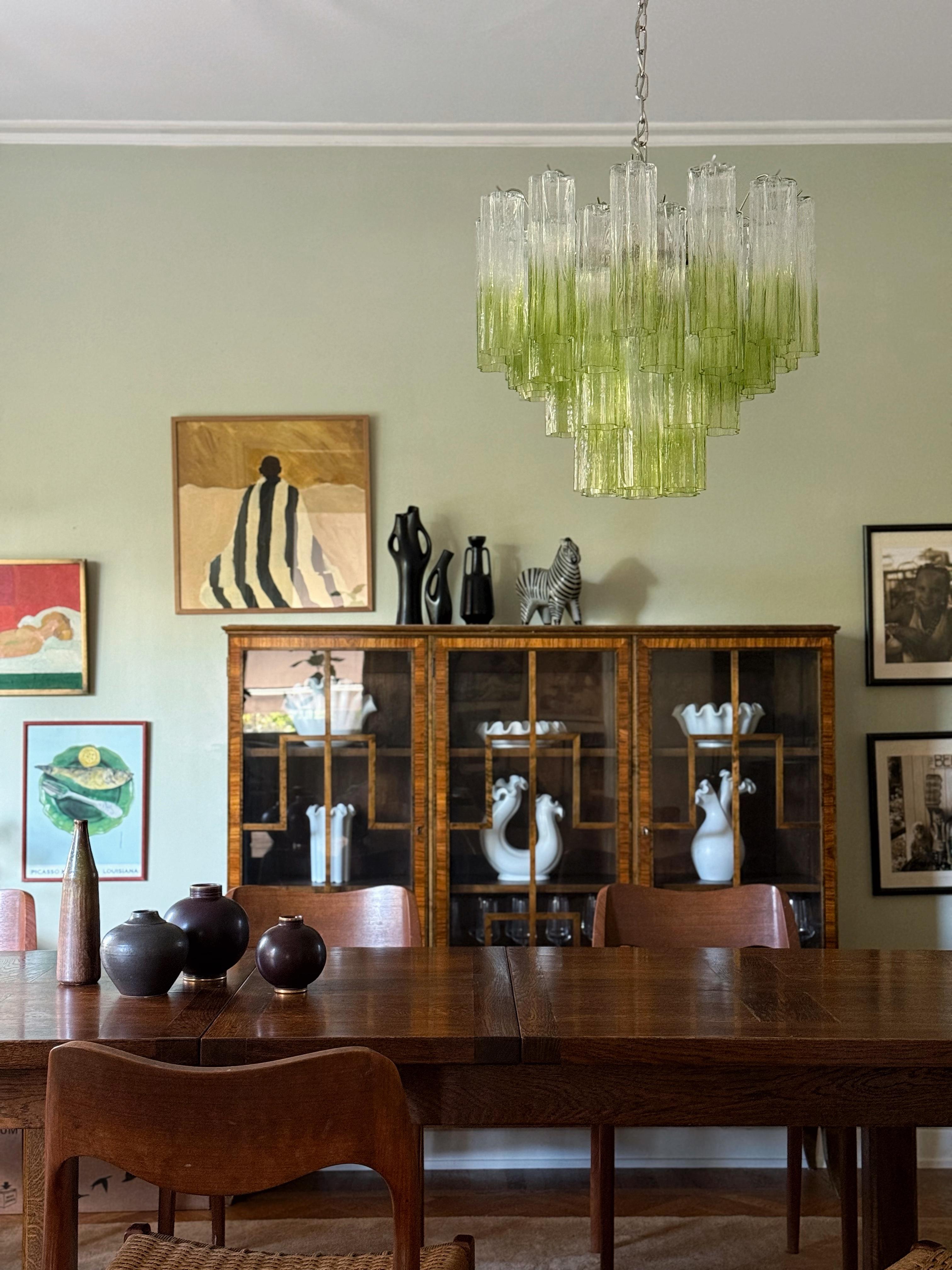 Eclectic Bold and Colorful Murano Chandeliers with prisms in ombre colored green glass fading into clear glass.
Green Murano Chandelier with Tubular Tronchi Formed Glass Prisms in Traditional Italian Mid-Century Style.
The murano fixture is composed