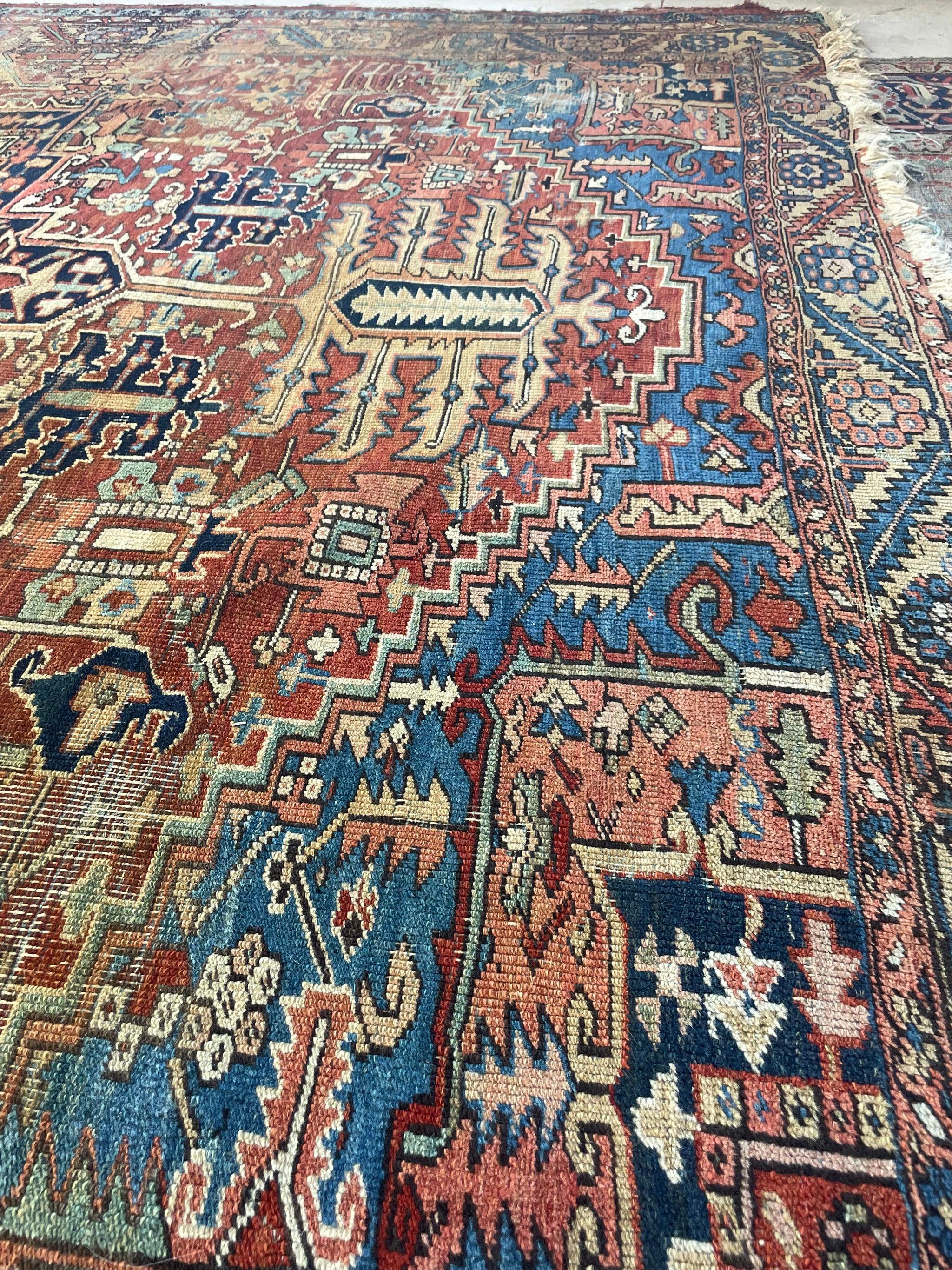 Eclectic & Funky Antique Heriz Rug  Fantastic Personality & Colors, C. 1910-20's

About: Unreal Antique Heriz rug, one of the most beautiful we've ever seen.  The field of the rug alone is a masterclass in abrash as it shifts from clay, to