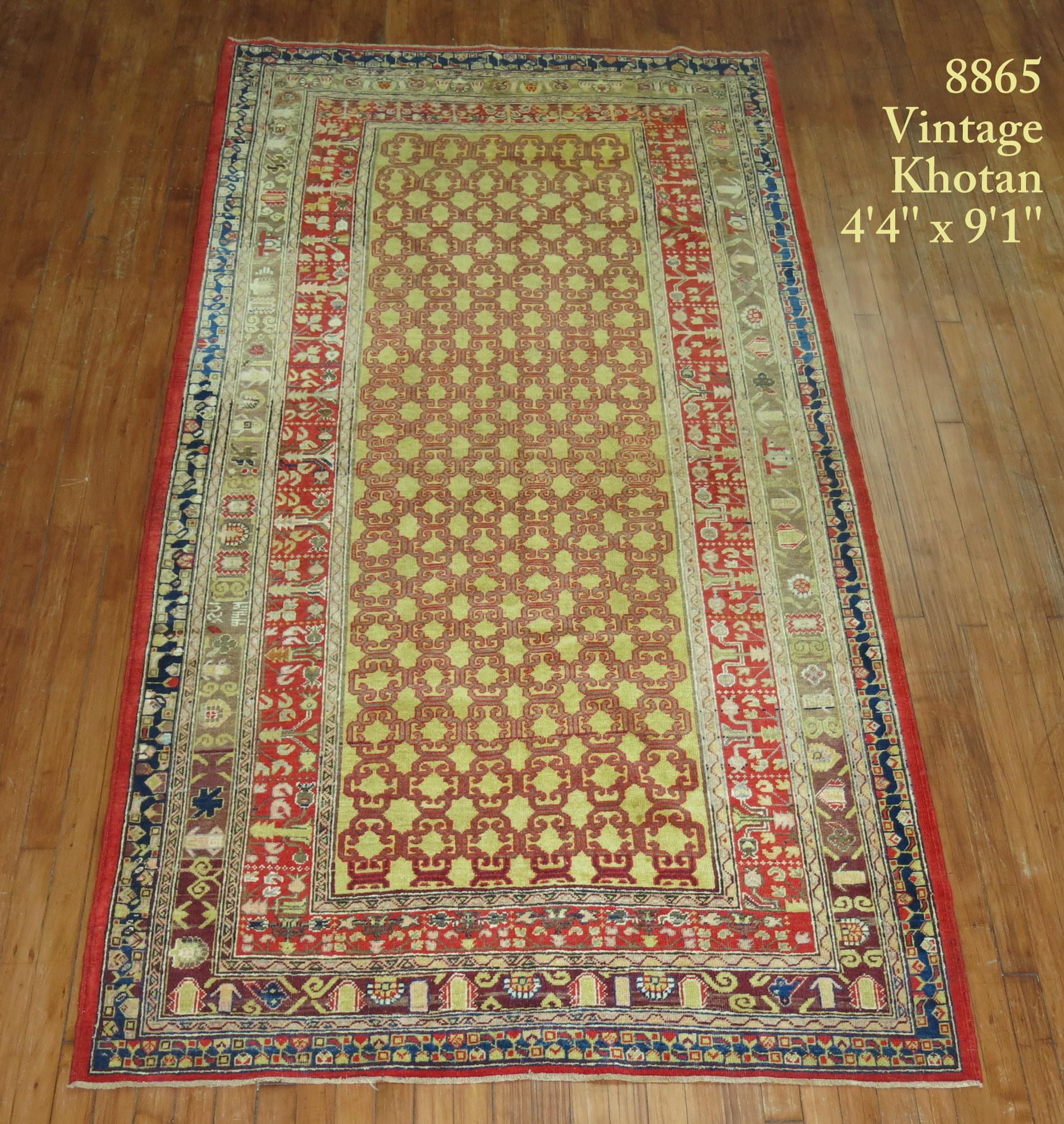 A colorful East Turkestan Khotan rug from the early 20th century
Measures: 4'4