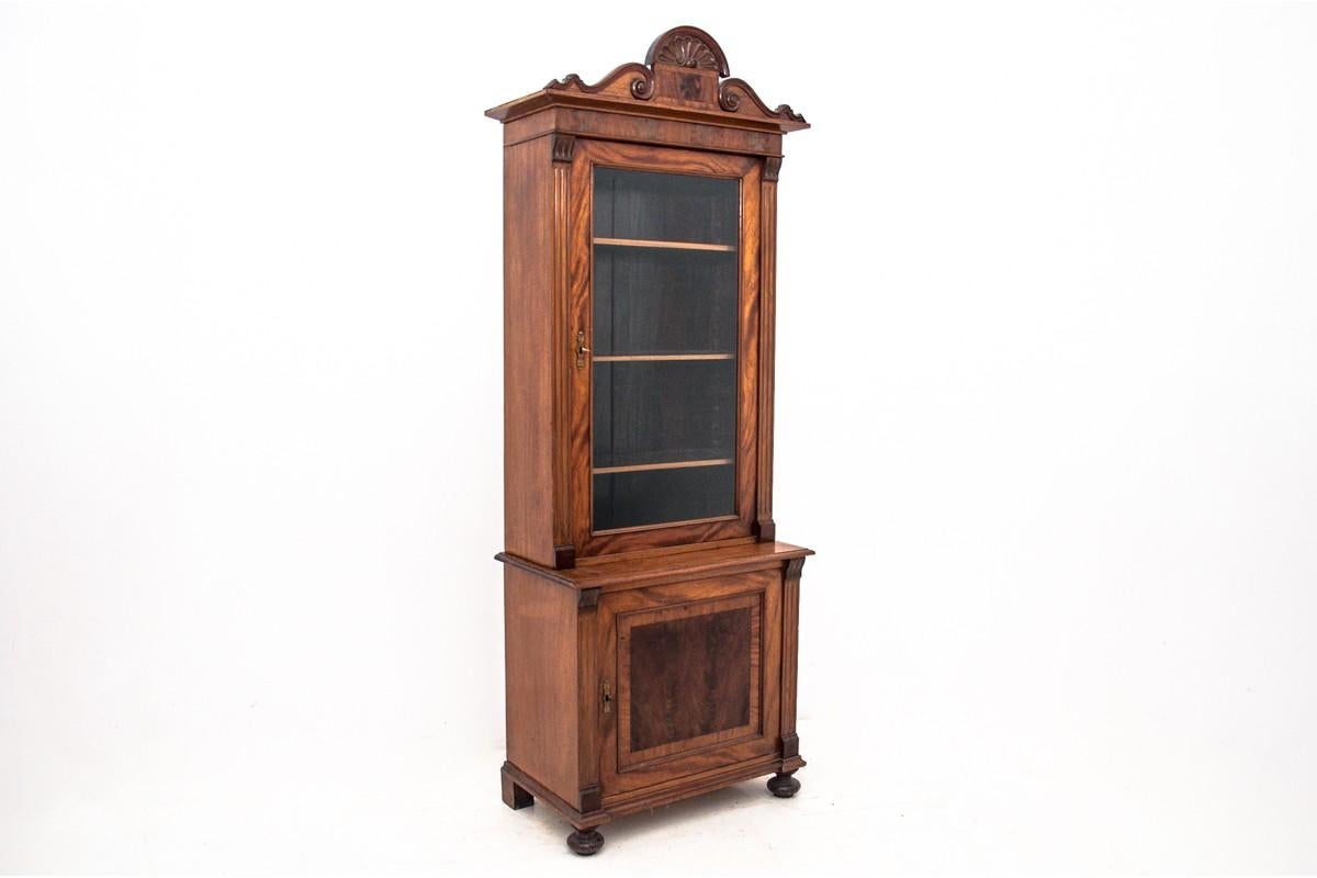 Antique library from the beginning of the 20th century.

Dimensions: height 217 cm / width 80 cm / depth 44 cm.