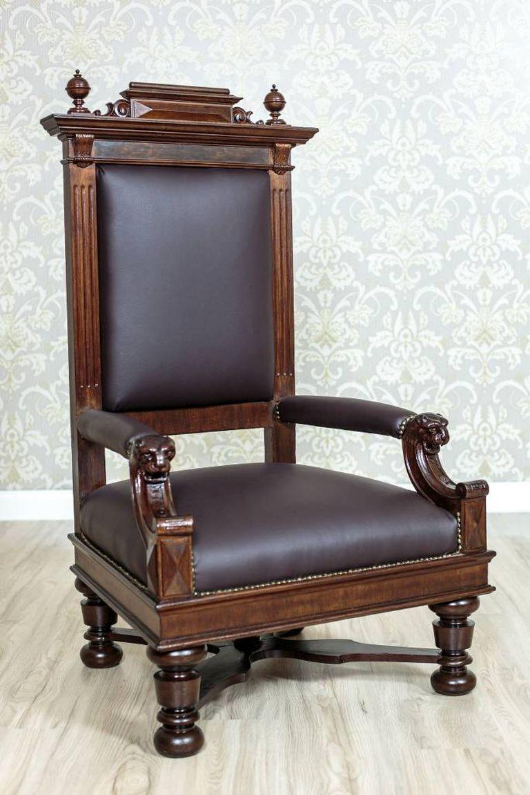 Hieratism and simplicity, these are distinctive features of this Eclectic armchair circa 1920. The item has been made in noble walnut wood, and comes from Northern Europe.

Presented armchair is monumental and extremely comfortable, thanks to its