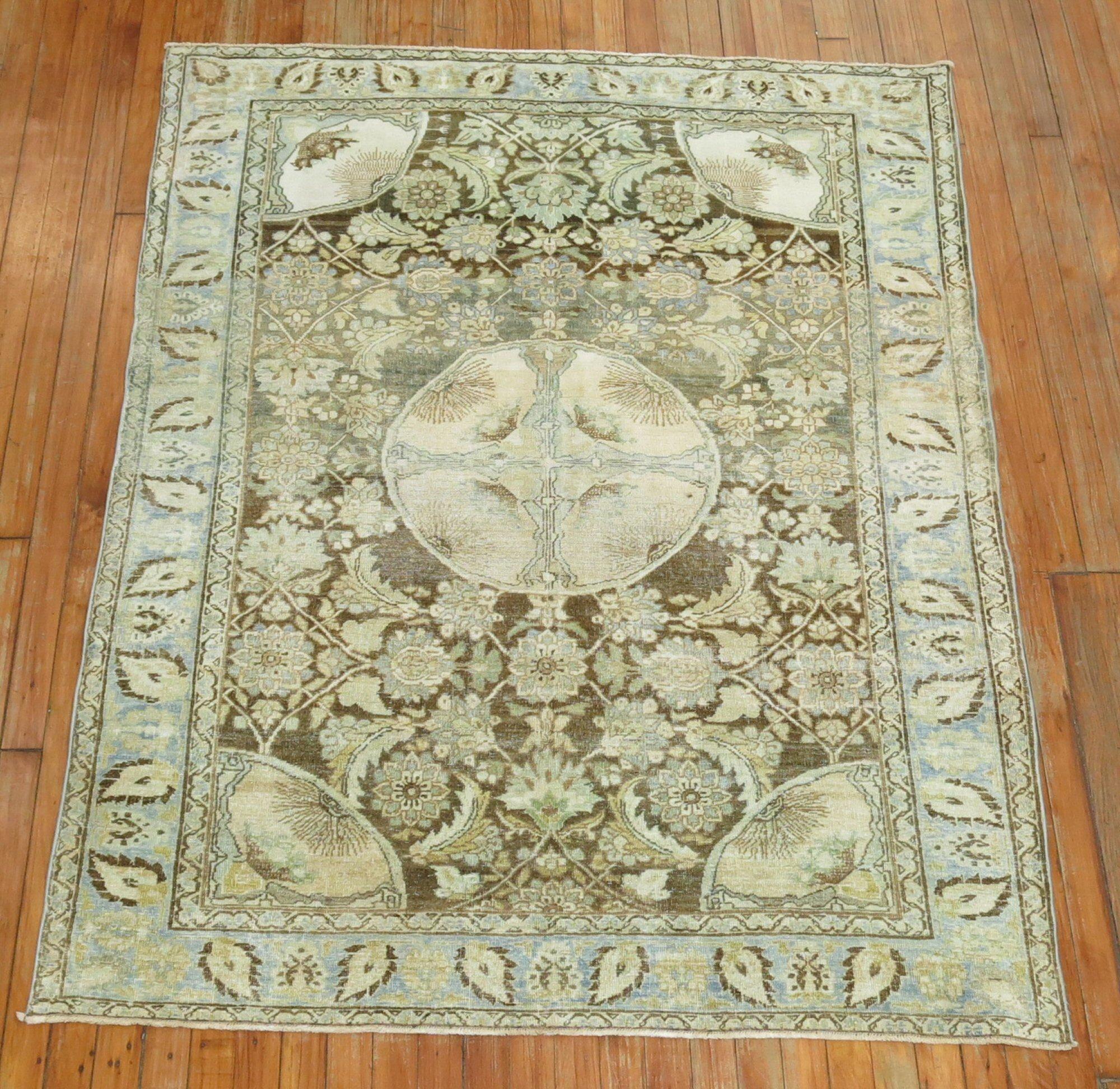 An eclectic 1920s Persian Tabriz rug 

Measures: 4'5