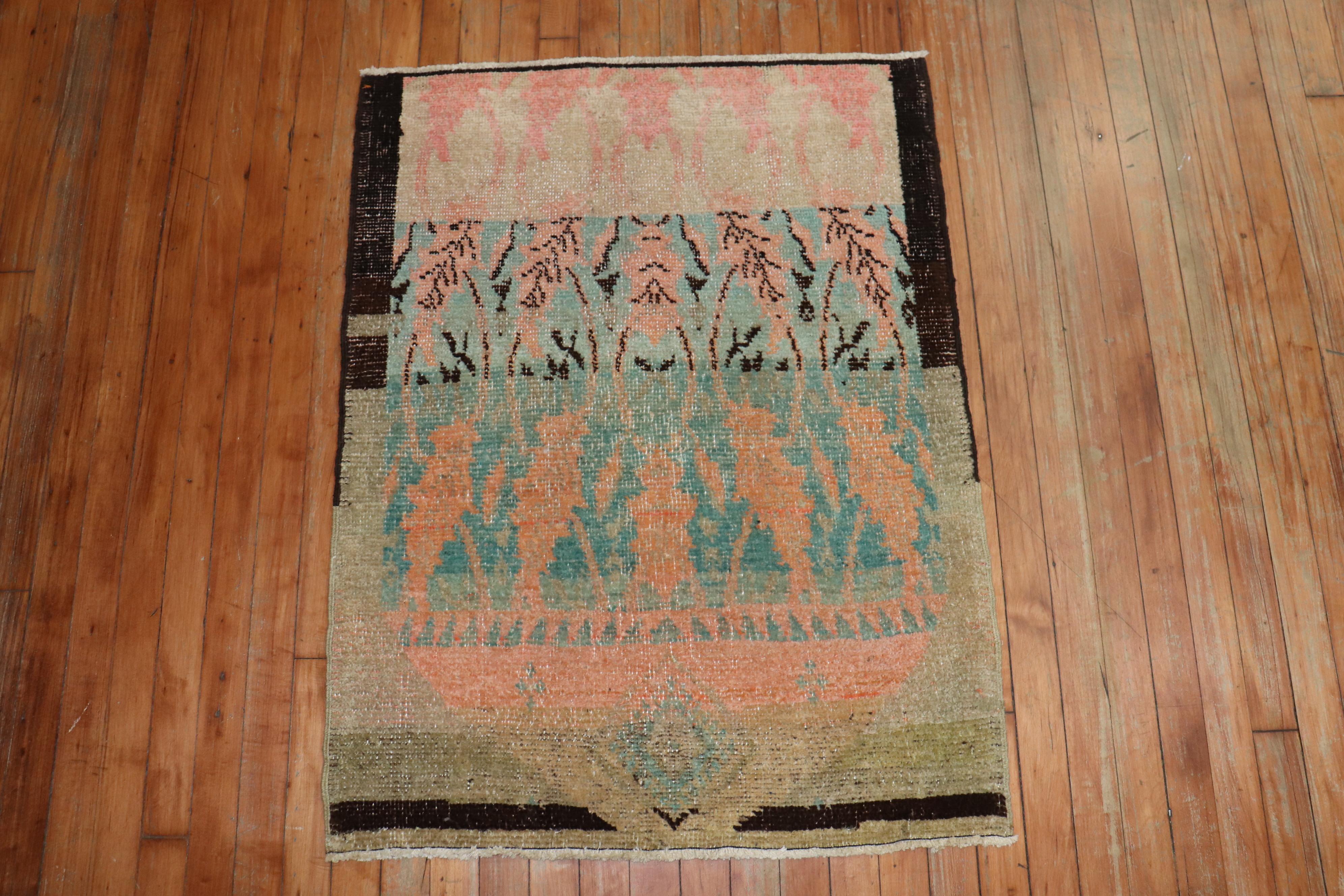 Eclectic Turkish Anatolian rug in peach, green, beige brown accents,

circa mid-20th century, measures: 2'8