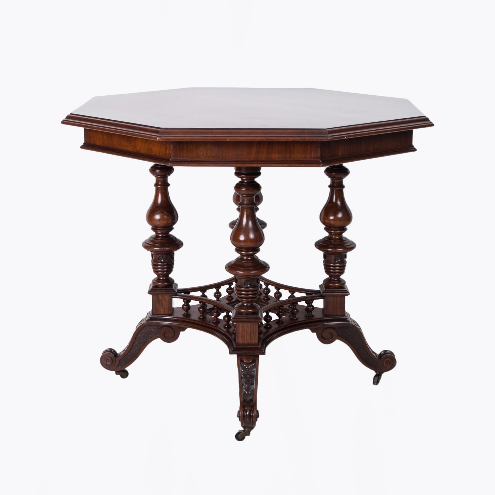 This beautiful table comes from Poland from second half of the 19th century. The legs are made of solid walnut. The top is made of coniferous wood veneered with walnut. Surface was finished with shellac polish, applied by hand with a tampon, which,