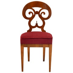 Ecléctica. Colección de sillas Biedermeier. Modelo Maria-Theresia, acabado nogal