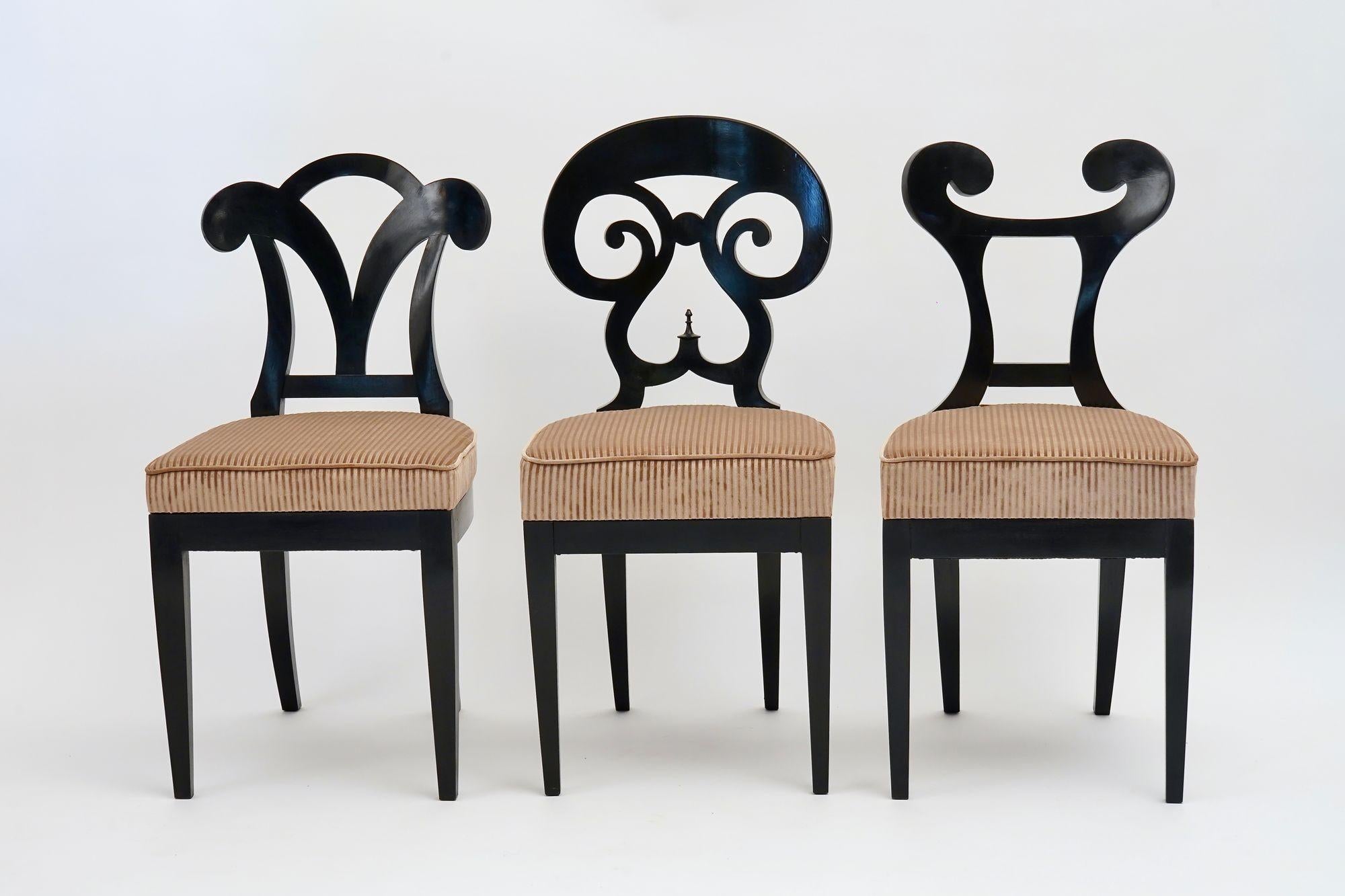 The Eclectica collection is a group of Biedermeier chairs offered in various way. Here offered in a selected set of 6 chairs each in a different style.

The chairs are made from precious  solid Italian walnut wood.  The ebonized finish is attained