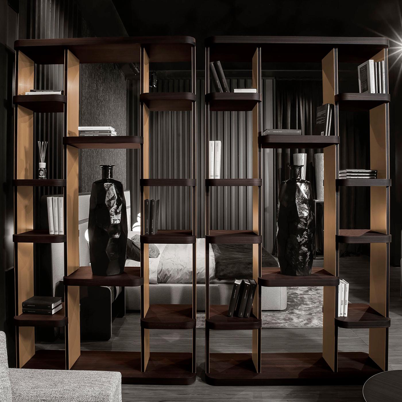 An innovative design of contemporary flair, this exquisite bookcase will make a bold addition to a refined living room or home study. Showcasing a double-sided profile, the base, top, and ten shelves are crafted of smoked eucalyptus veneered MDF.