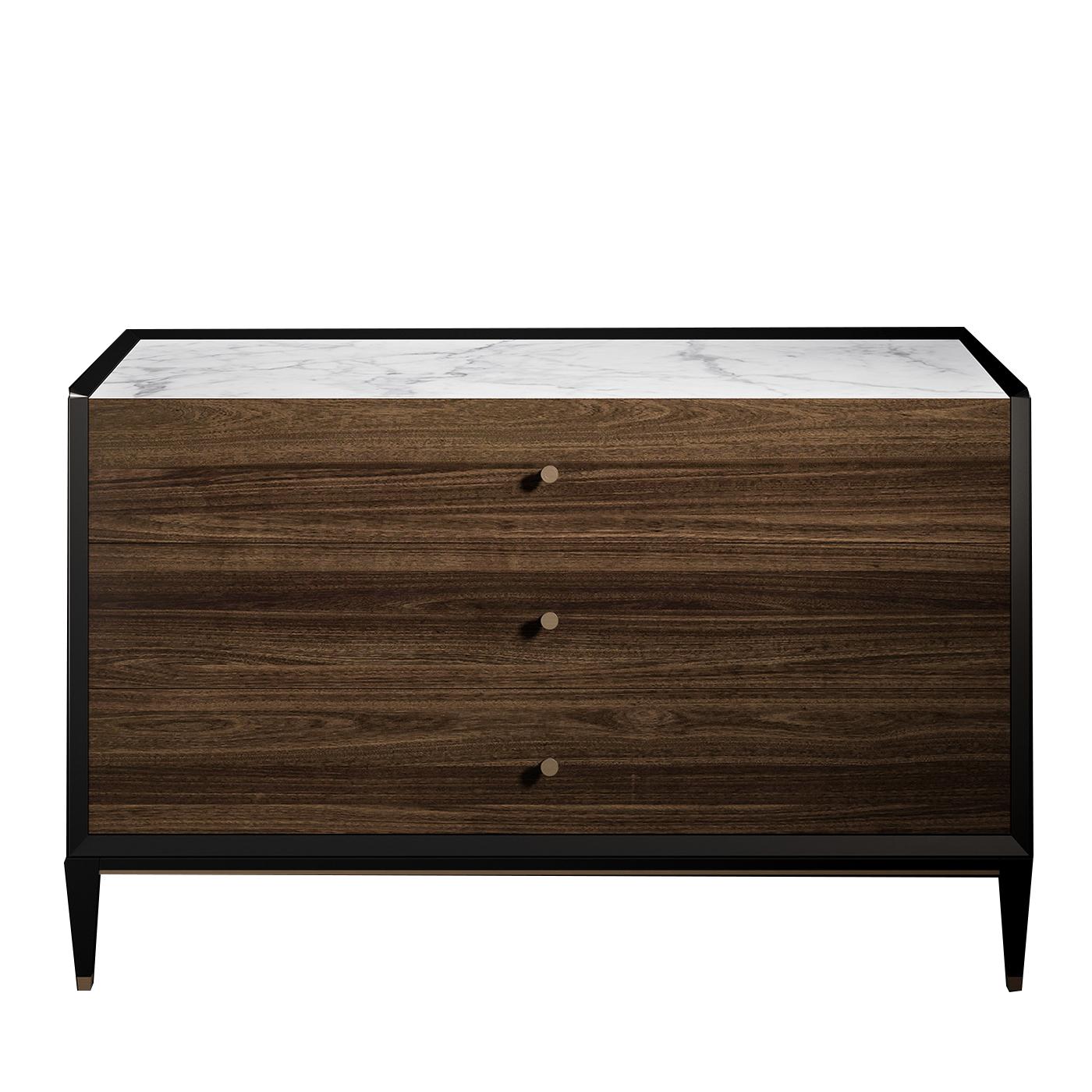 Supported by four tapered feet accented with metal ferules, this refined dresser has a sleek wooden frame with velvet-like, black finish. The encased compartment unit features three brown veneered drawers, each featuring a small, round handle in