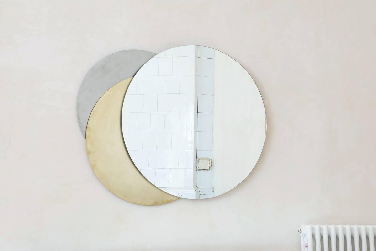 Dimensions: L 64, H 76cm.
Materials: Brass/mirror/stainless steel

Eclipse Mirror
“We need an inner light, which will stay in us, even when dark”. Being obsessed with the beauty and the mystery of the sun and the moon, Rooms decided to bring them