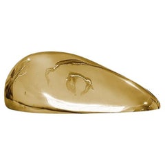 Eclipse II: Polished Brass Pebble Sculpture - Elegant Home Decor Statement Piece