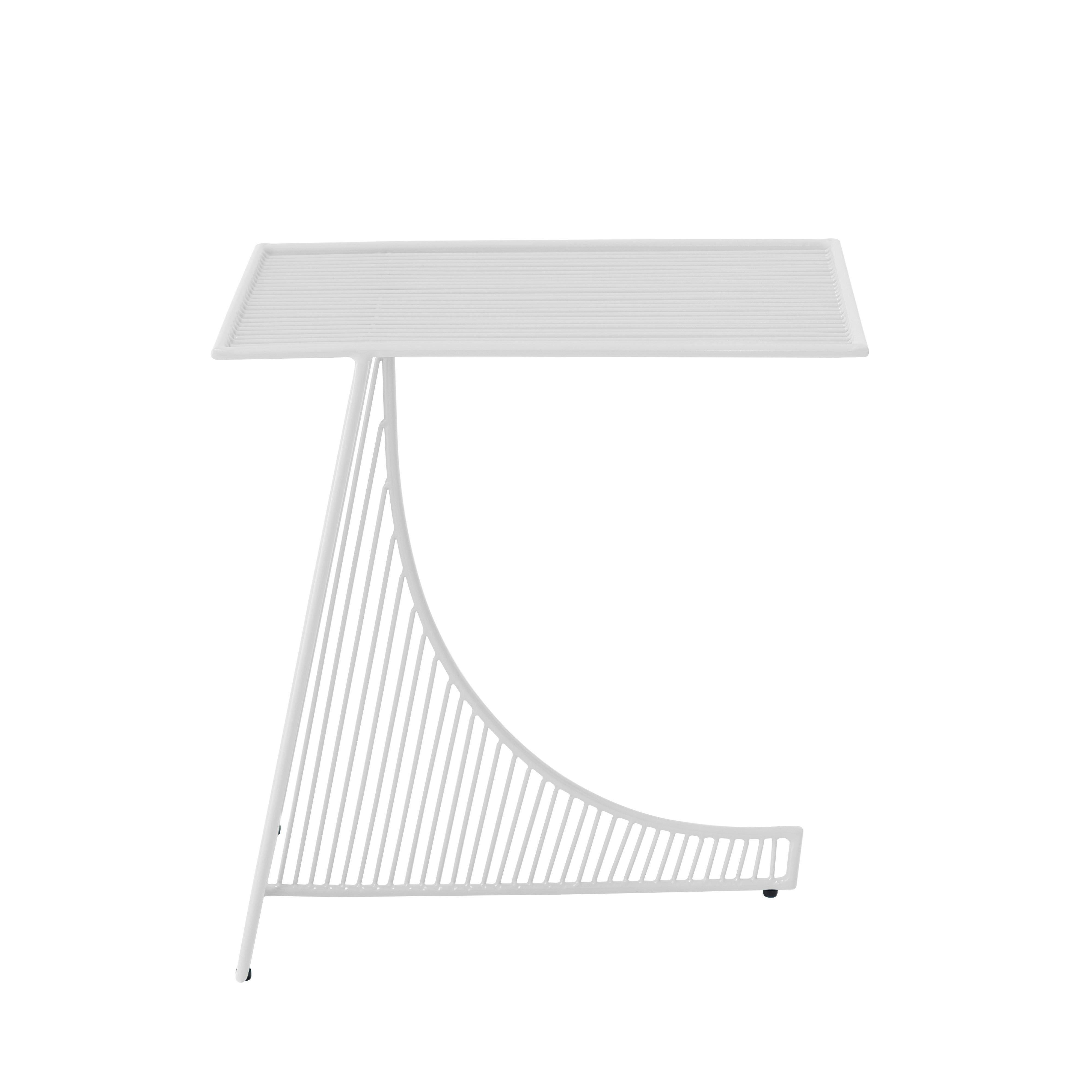 The unique curved shape sets this contemporary wire table apart. Get comfortable and pull this table close to a chair or sofa for an ideal relaxed work space. The modern shape compliments a garden or contemporary interior, and the terrazzo top adds