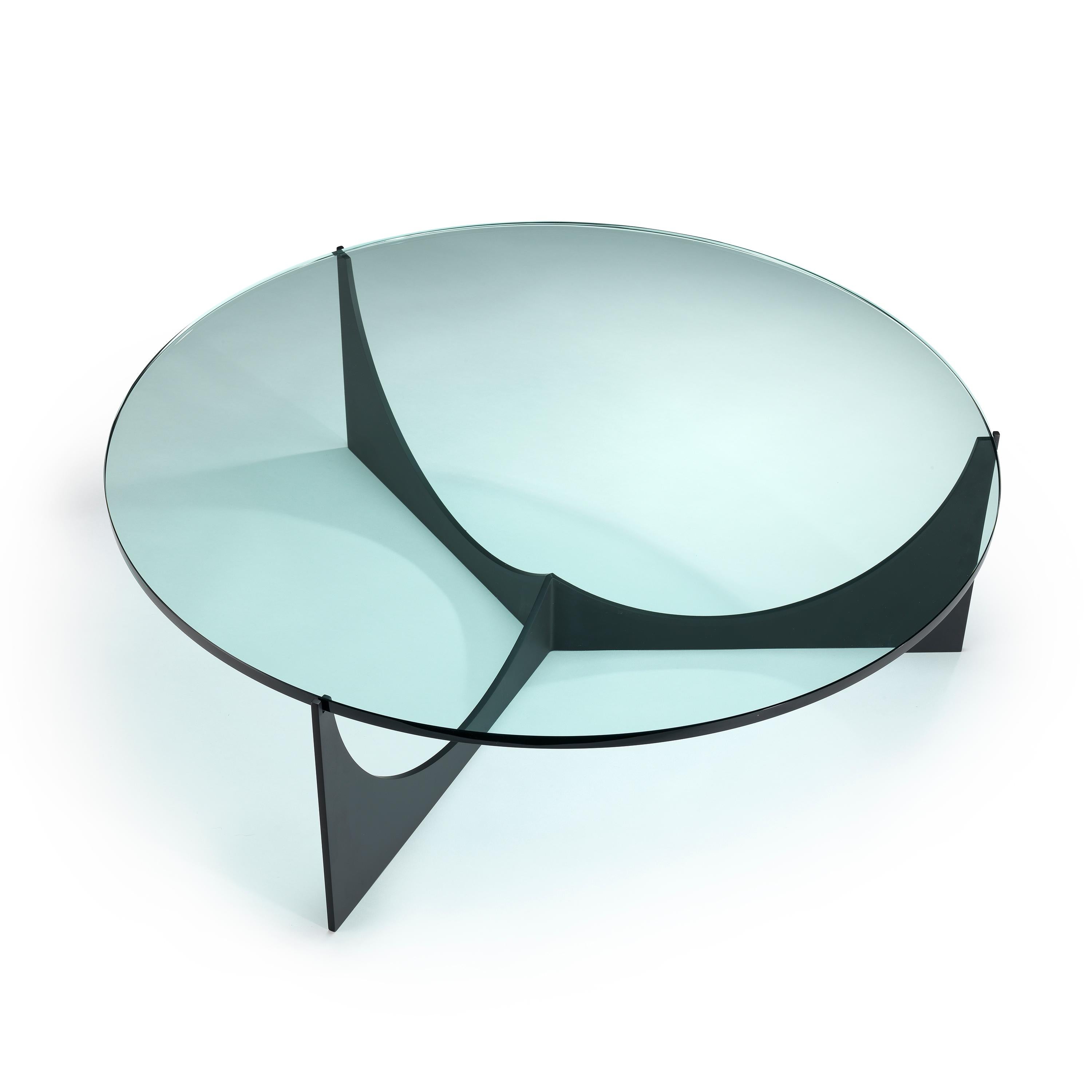 Ten10 eclipse coffee table with a stainless steel base polished or powder coated matte black and a round top 43 3/8