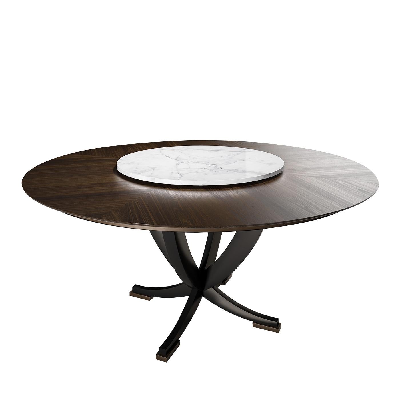 Characterized by a bold aesthetic and a chiaroscuro visual contrast, this luxurious dining table will complement any modern interior. Supported by a sophisticated shape of intersecting wooden C-shaped legs, enhanced by a black velvet-like finish and