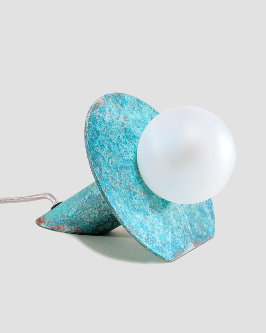 Eclipse Verdigris Desk Lamp by Carla Baz
Dimensions: D 15 x W 15 x D 11 cm.
Materials: Verdigris metal.
Weight: 0,9 kg.

Available in different materials: verdigris metal, copper and stainless steel. Please contact us. 

Inspired by the Sun eclipse,