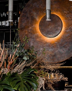 Escultura de pared iluminada Eclissare de Aura Carpio