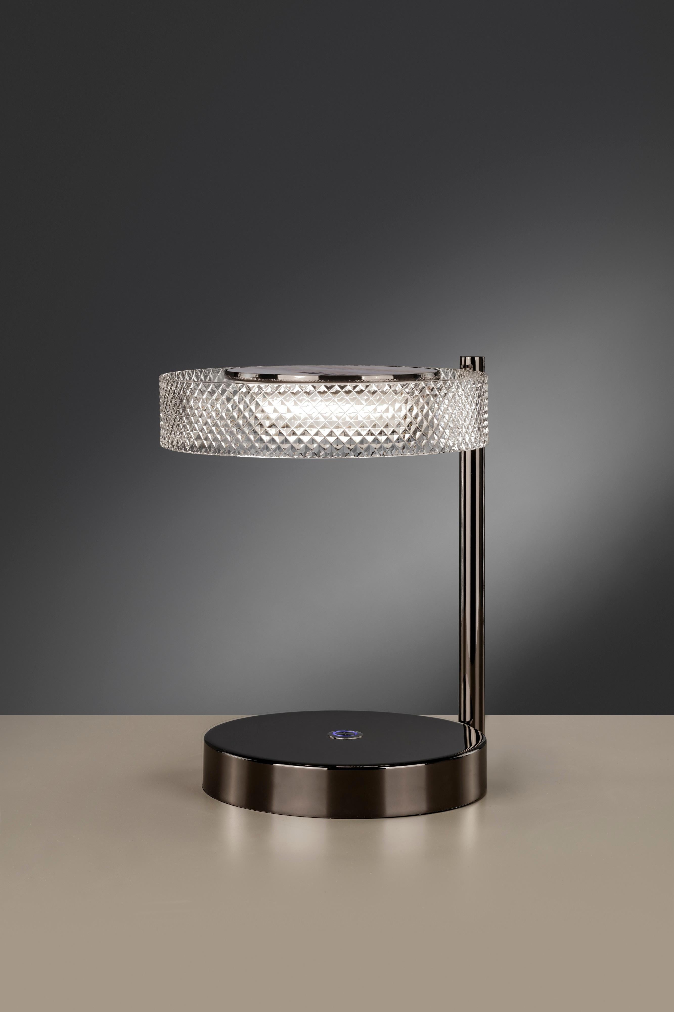 Eclissi Table Lamp by Euroluce Lampadari
Dimensions: Ø 22 x H 25 cm.
Materials: Aluminum, metal, glass, and marbled glass.

Available in different colors. Prices may vary. All our lamps can be wired according to each country. If sold to the USA it
