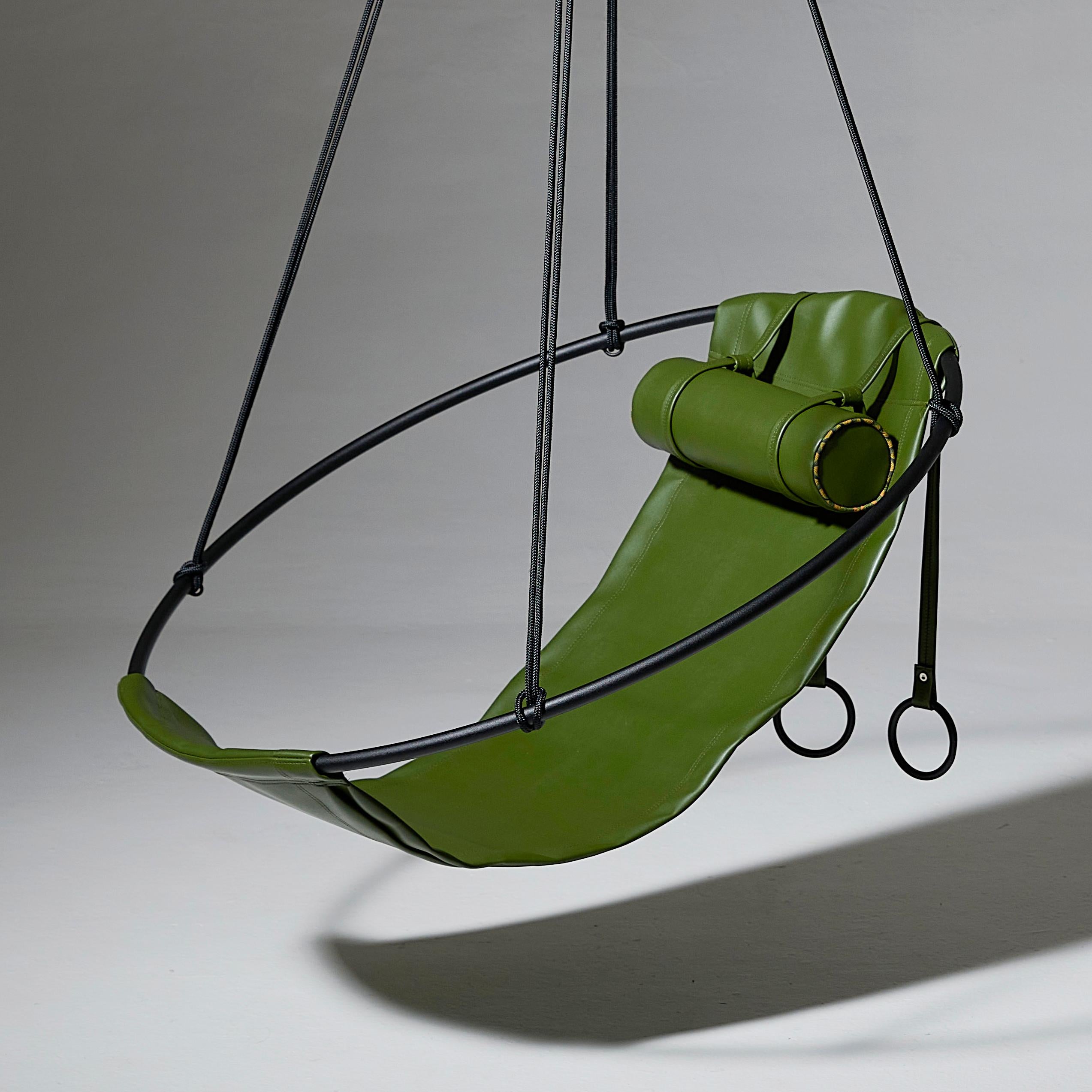 Our SLING hanging chair which is crafted with cactus leather – a highly-sustainable
environmentally-friendly vegan material.
Stripped away from all excess, this hanging chair has a circular frame with the sheets of cactus leather hanging loose