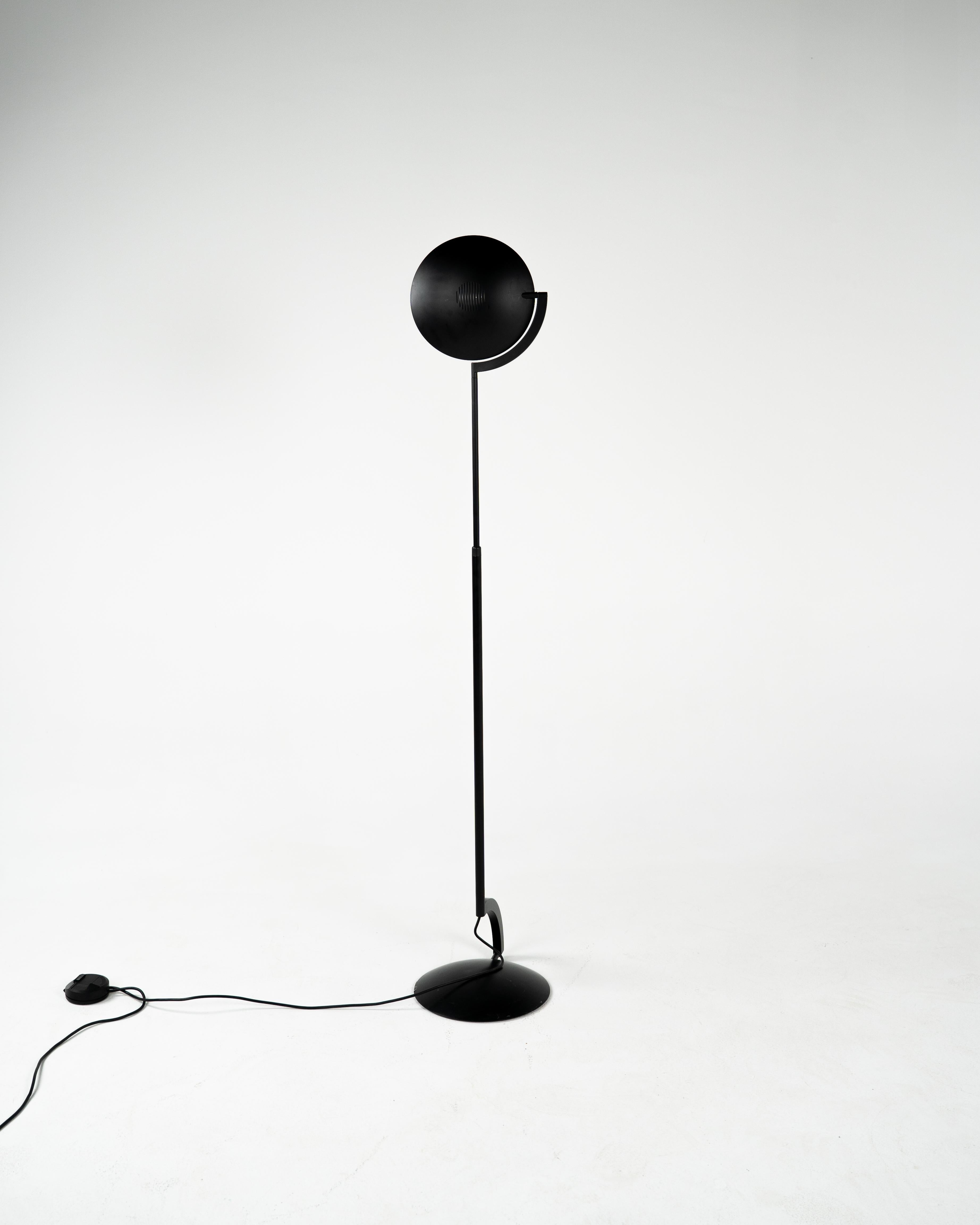 The Eco Terra Floor Lamp, designed by Mário Barbaglia and Marco Colombo for Italiana Luce, is a striking example of late 20th-century Italian modernism. This sculptural floor lamp features a distinctive upturned dish-shaped diffuser, supported by a