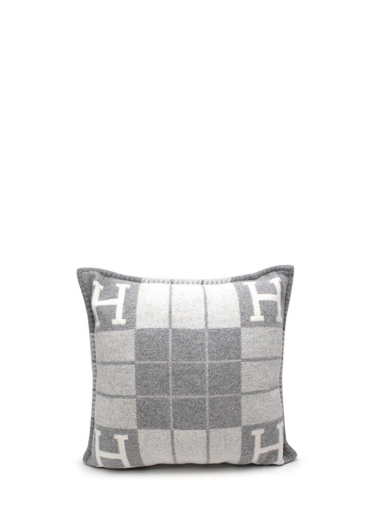 Hermes Ecru & Gris Clair Cashmere-Blend Avalon Pillow Small Model

- Small model of the iconic Avalon pillow featuring a geometric tone-on-tone pattern, with house H in each order
- Blanket stitched edge


Materials 
90% Wool 
10% Cashmere