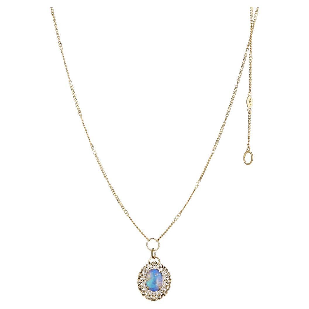 DETAILS
COLOR: Yellow gold
COMPOSITION: 14kt yellow gold
Center Australian opal totalling 0.20ct
Diamonds totalling 0.23ct  

SIZE AND FIT
Pendant 13 x 15.5mm
Chain length 45cm