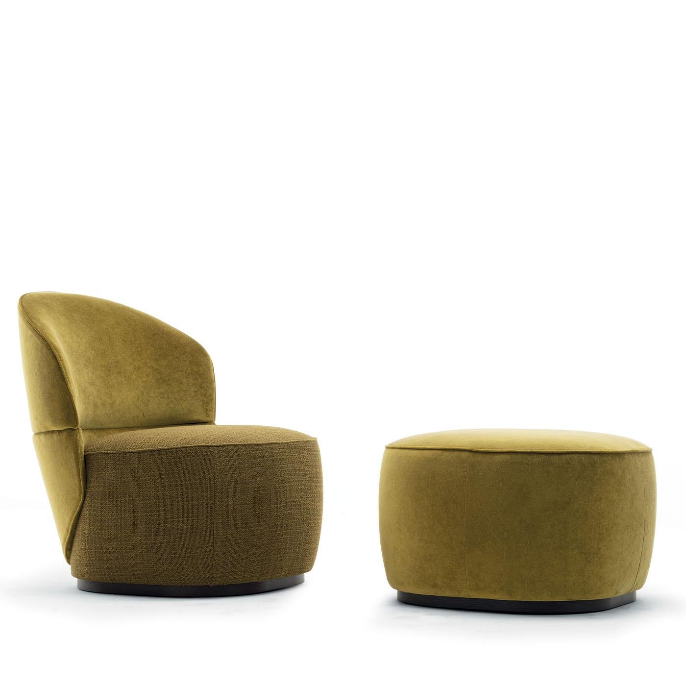 Enveloping curves outline the sleek silhouette of this armchair, a lively addition to neutral-toned modern decors. Sealed by an EX fabric upholstery offered in a vibrant acid-green hue, its volumes ensure impeccable comfort, guaranteed by the