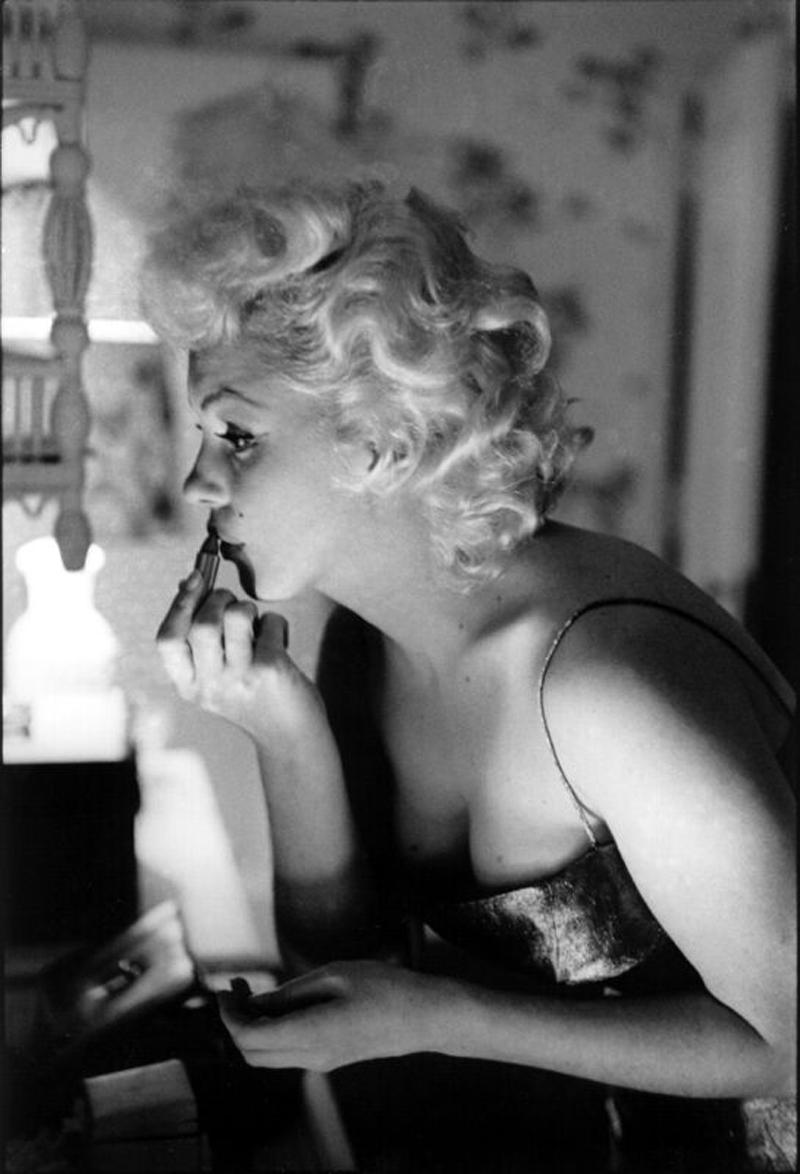 Marilyn Getting Ready To Go Out - Photograph by Ed Feingersh