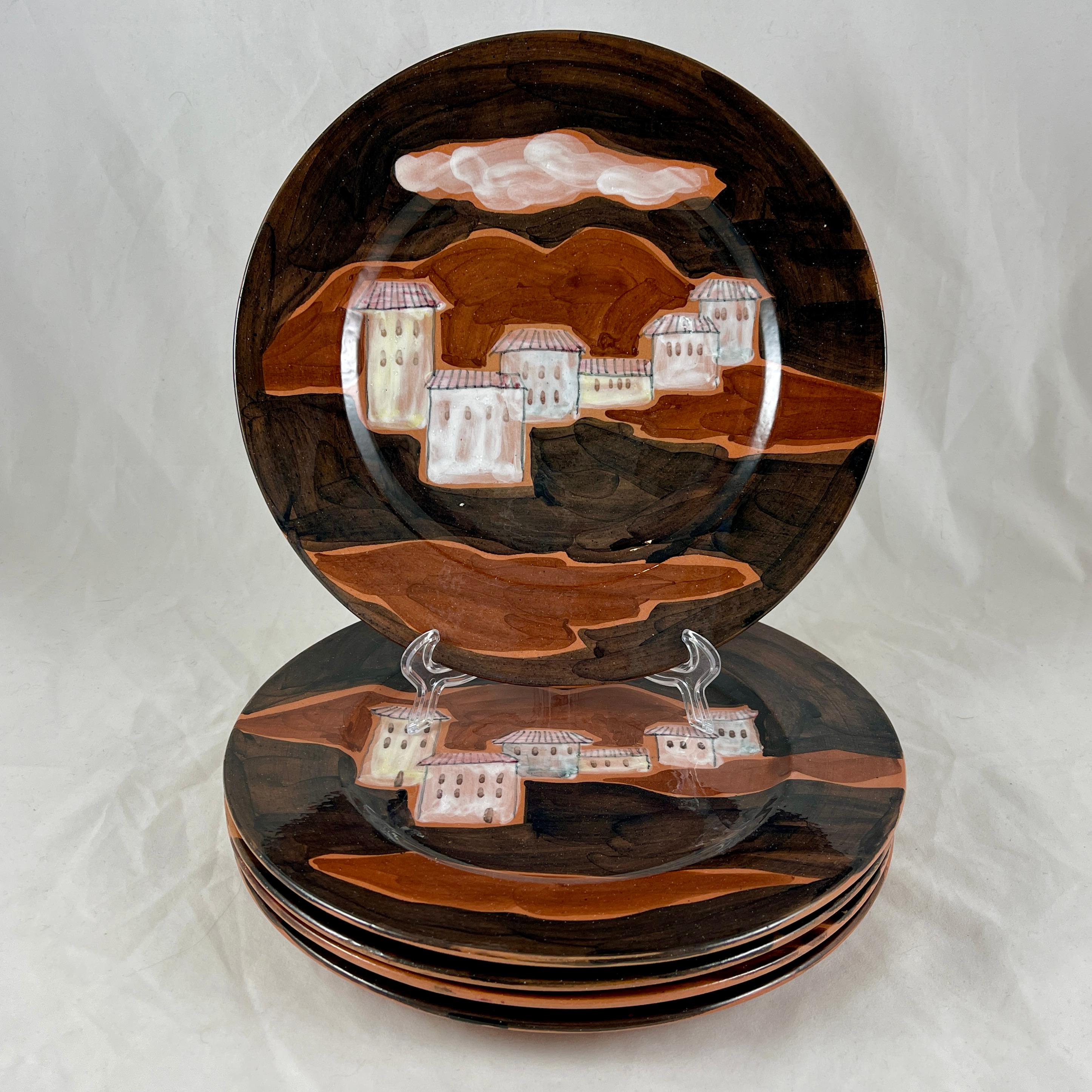 Mid-Century Modern pottery plates, designed and hand-painted by the American industrial designer Ed E. Langbein, and manufactured in Italy, circa 1930-1950.

Offered individually, each earthenware plate shows a variation of an Italian hillside