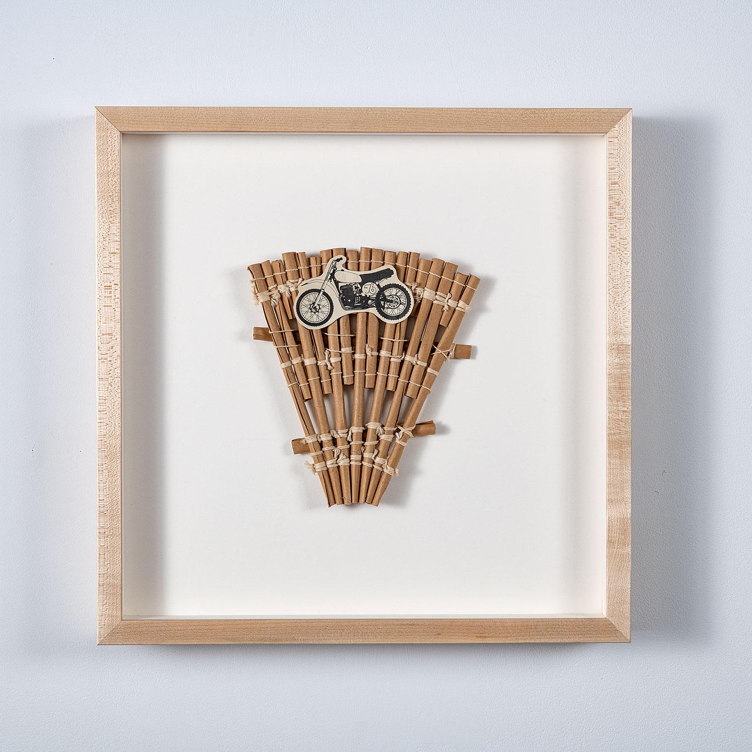 Ed Rossbach was known for experimenting by using unexpected materials and symbols in his baskets, vessels, and assemblages including plastic, cotton balls, cardboard and iconic images. In Staplers, he has woven, sculpted, and collaged together paper