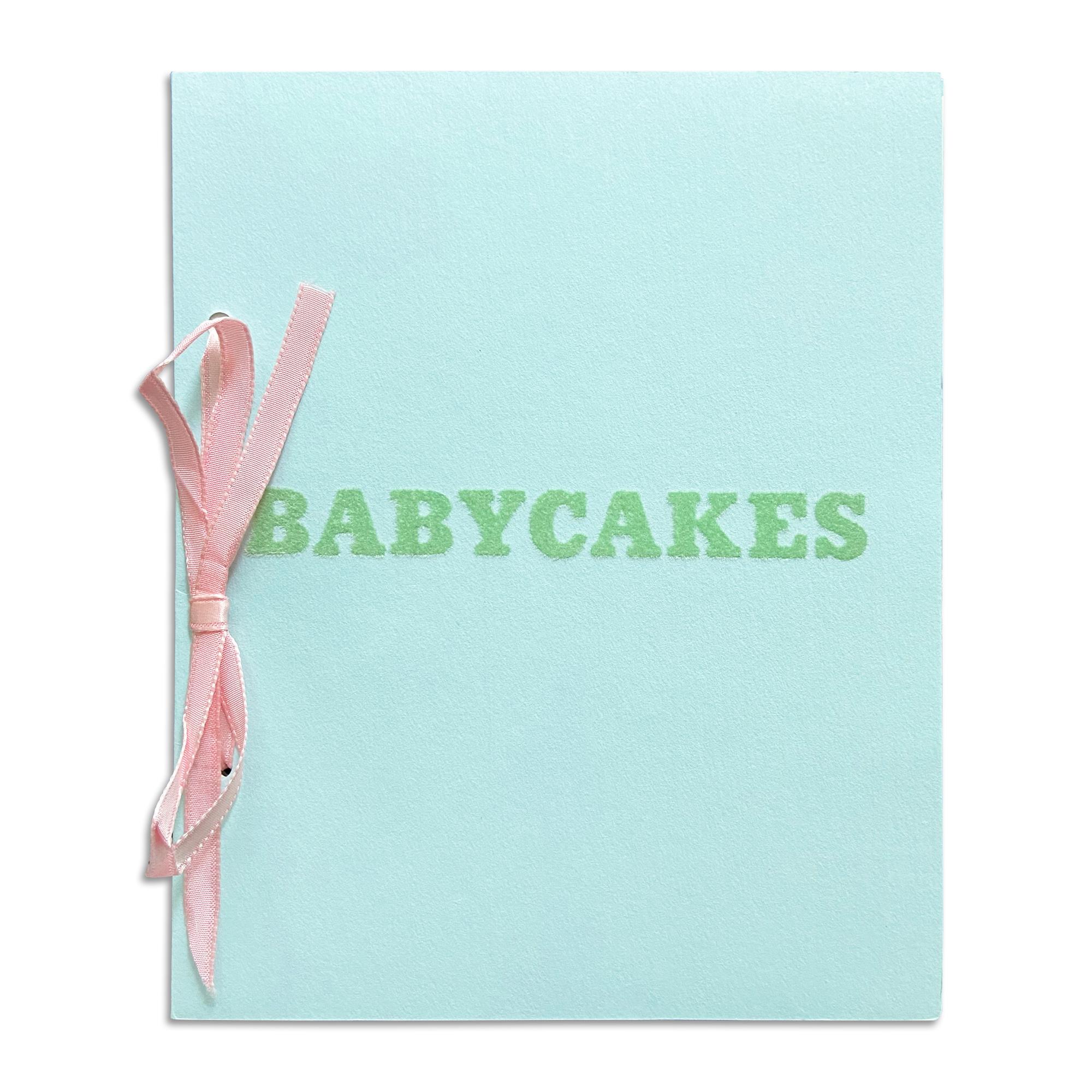 Ed Ruscha (American, b. 1937)
Babycakes with Weigths, 1970
Medium: Artist's book, offset printed (white paper, blue paper with green flocking, pink satin ribbon)
Dimensions: 19 × 15.2 × 0.5 cm (7 1/2 × 6 × 3/16 in) 
Publisher: Multiples, Inc., New