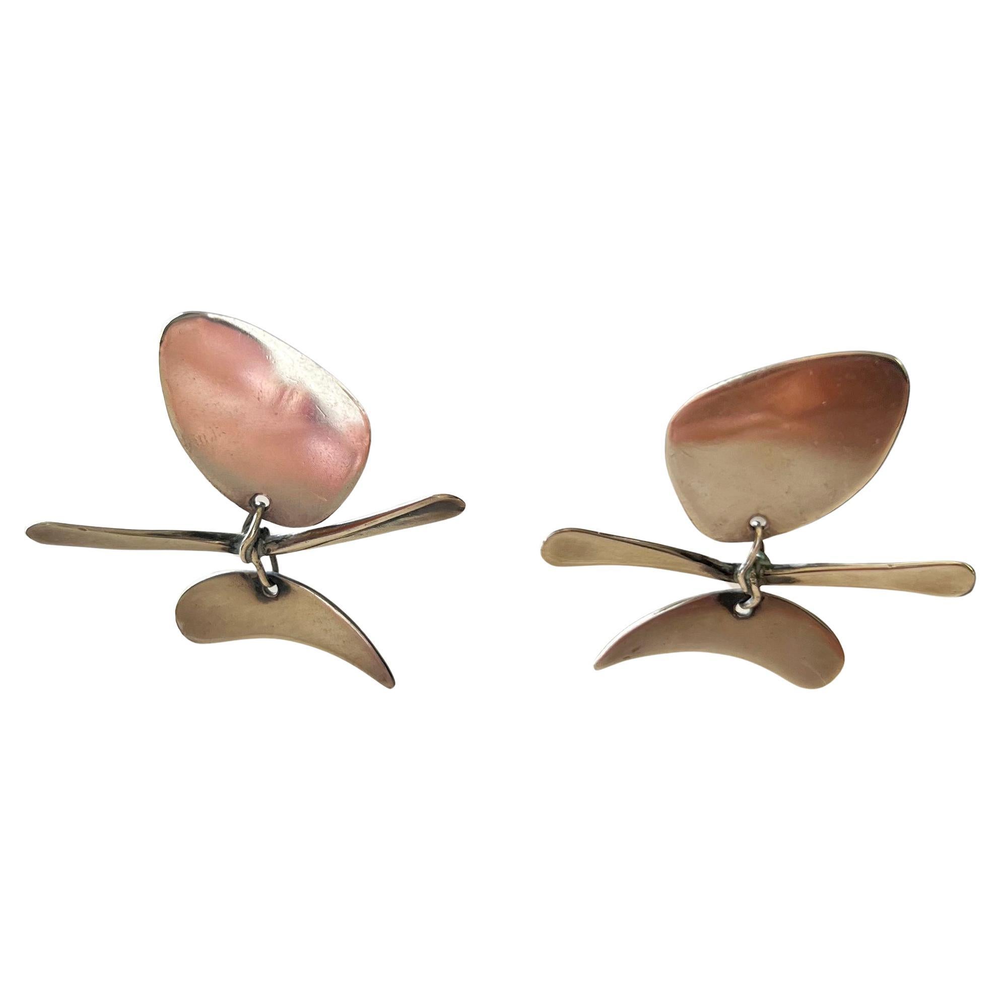 1950s sterling silver kinetic modernist earrings created by Ed Wiener of New York, New York.  Earrings measure 1.25