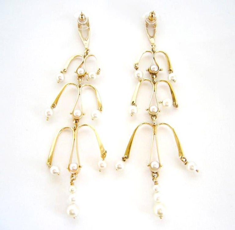 14k gold and pearl chandelier style earrings created by Ed Wiener of New York City, New York.  Earrings measure 4.5