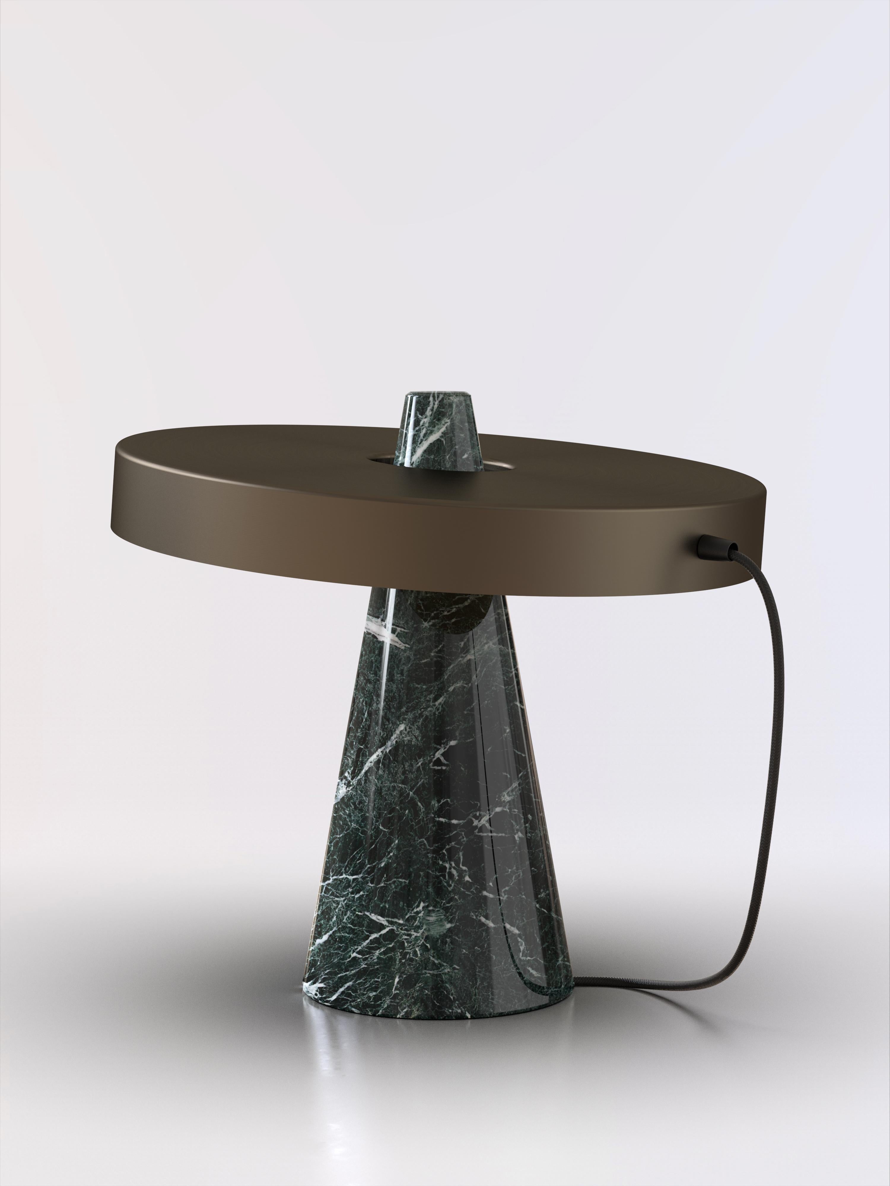 Table lamp with Guatemala green stone base and bronze lightshade.
The light shade is disconnected from the stone base and free to tilt, allowing multiple change of styles.