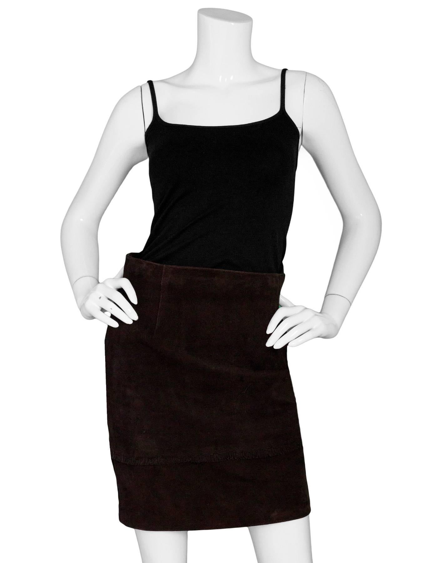 Eddi Brown Suede Skirt Sz IT42

Features fringe trim

Made In: Italy
Color: Brown
Composition: Leather
Lining: Brown textile lining
Closure/Opening: Back zip closure
Overall Condition: Excellent pre-owned condition with the exception of some gentle