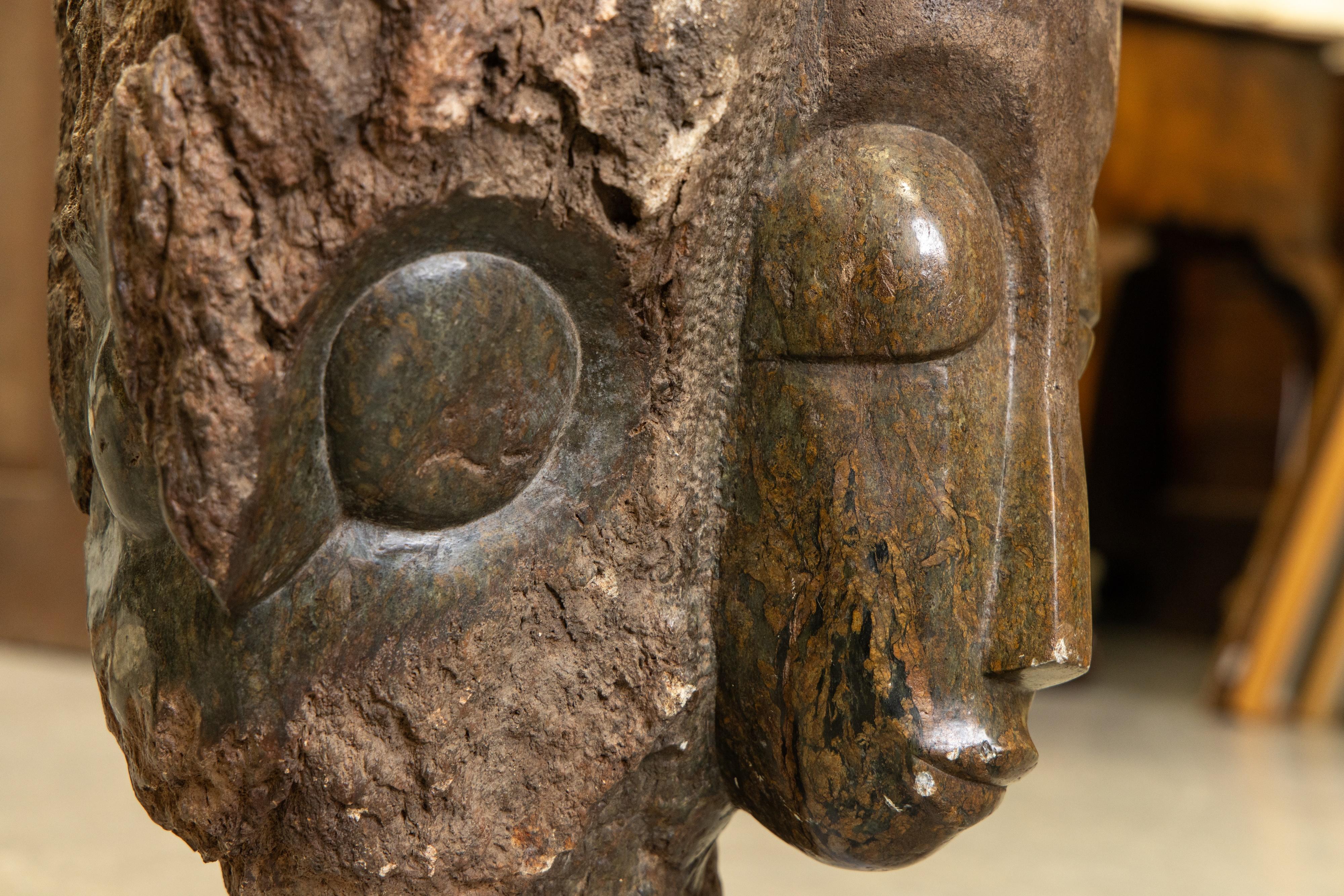 Late 20th Century Eddie Masaya (Zimbabwean, b. 1960), Shona sculpture of Twin Faces For Sale