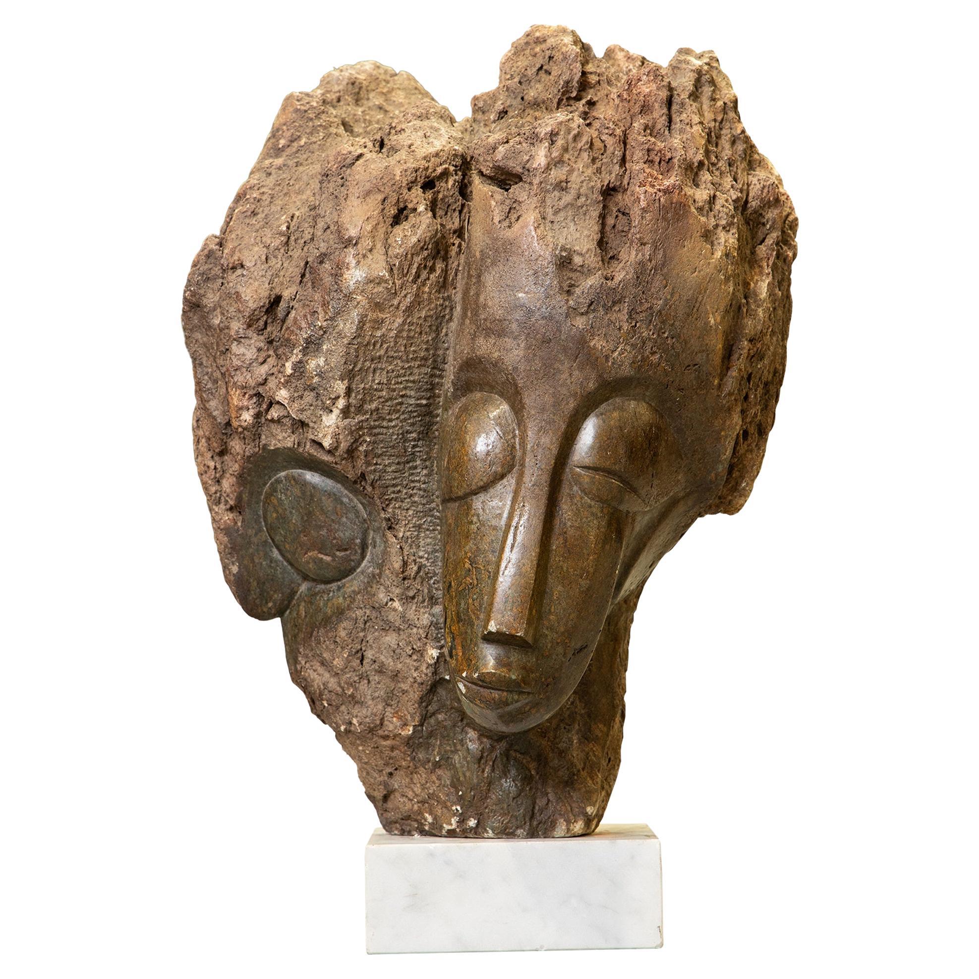 Eddie Masaya (Zimbabwean, b. 1960), Shona sculpture of Twin Faces For Sale